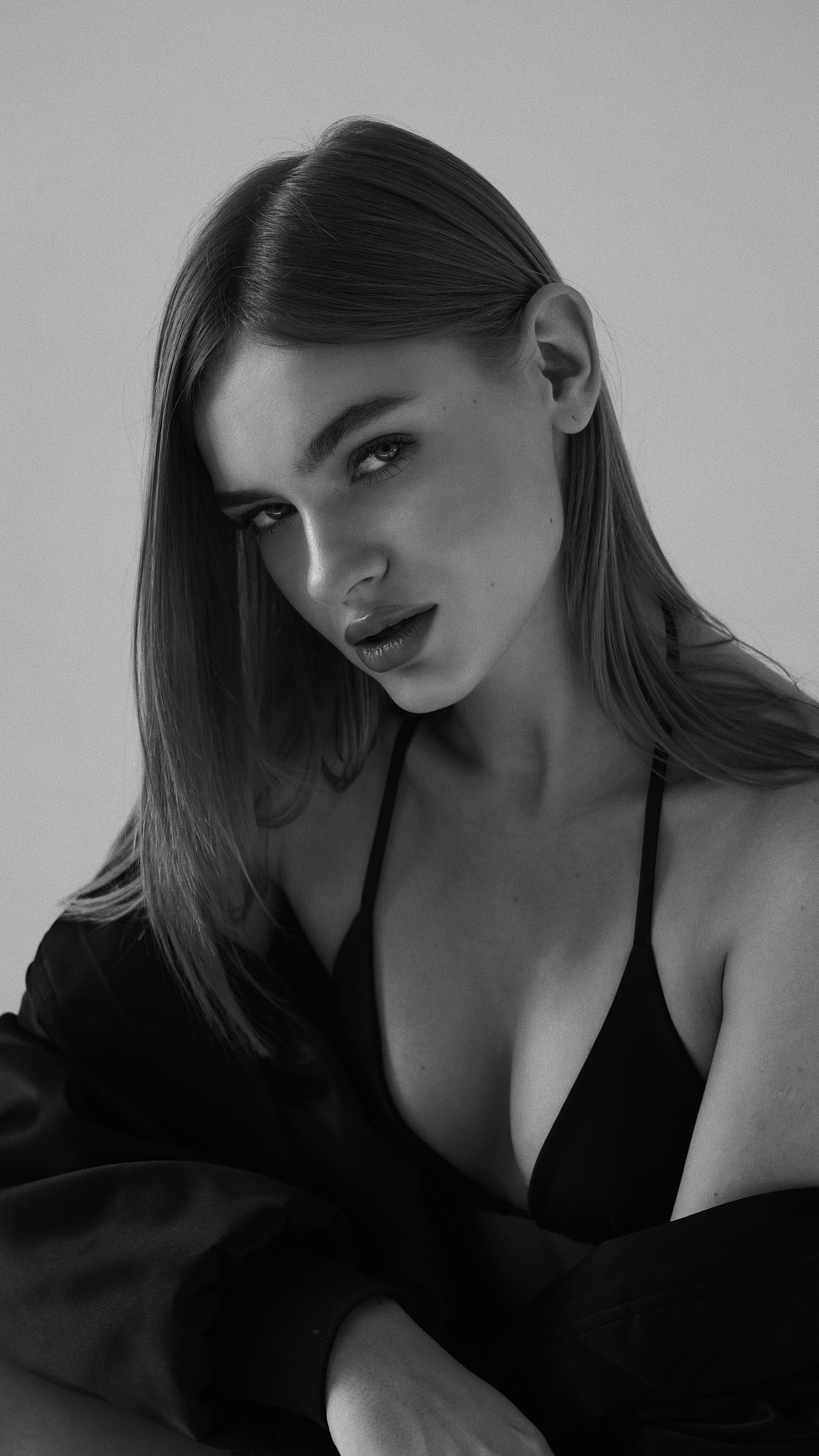 Black-and-white close-up portrait of a woman