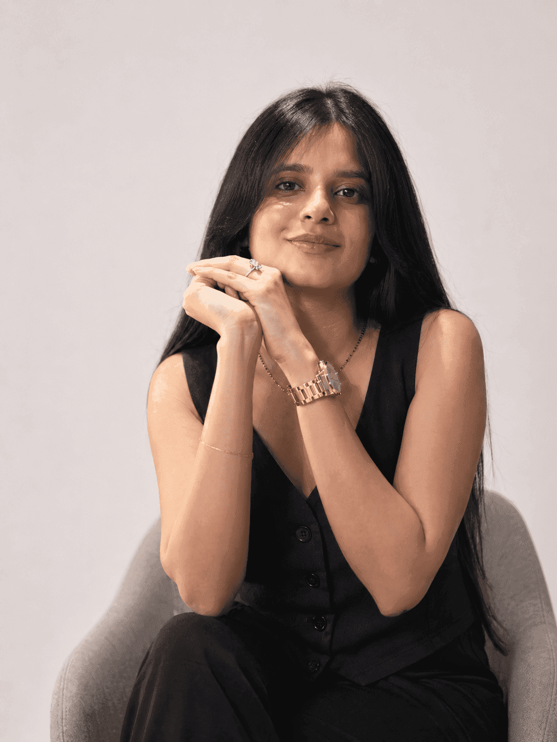 Eetisha Jain, Co-Founder and COO, sitting confidently in a workspace