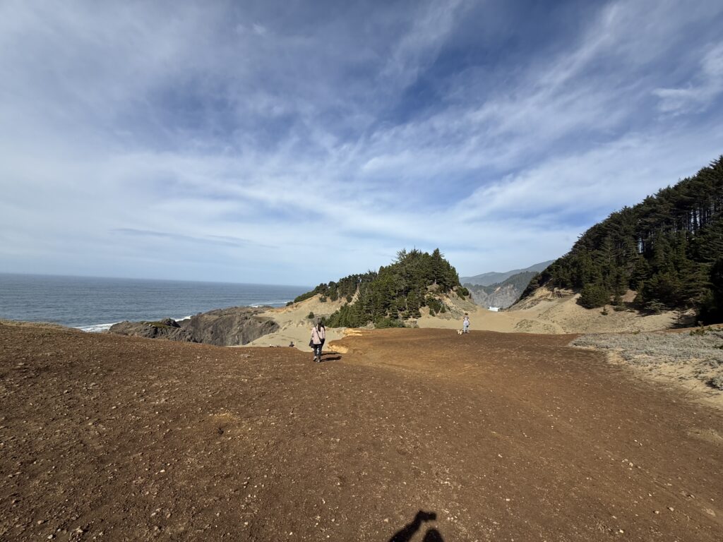 Family hiking the bluffs at Samuel H. Boardman State Scenic Corridor near Gold Beach