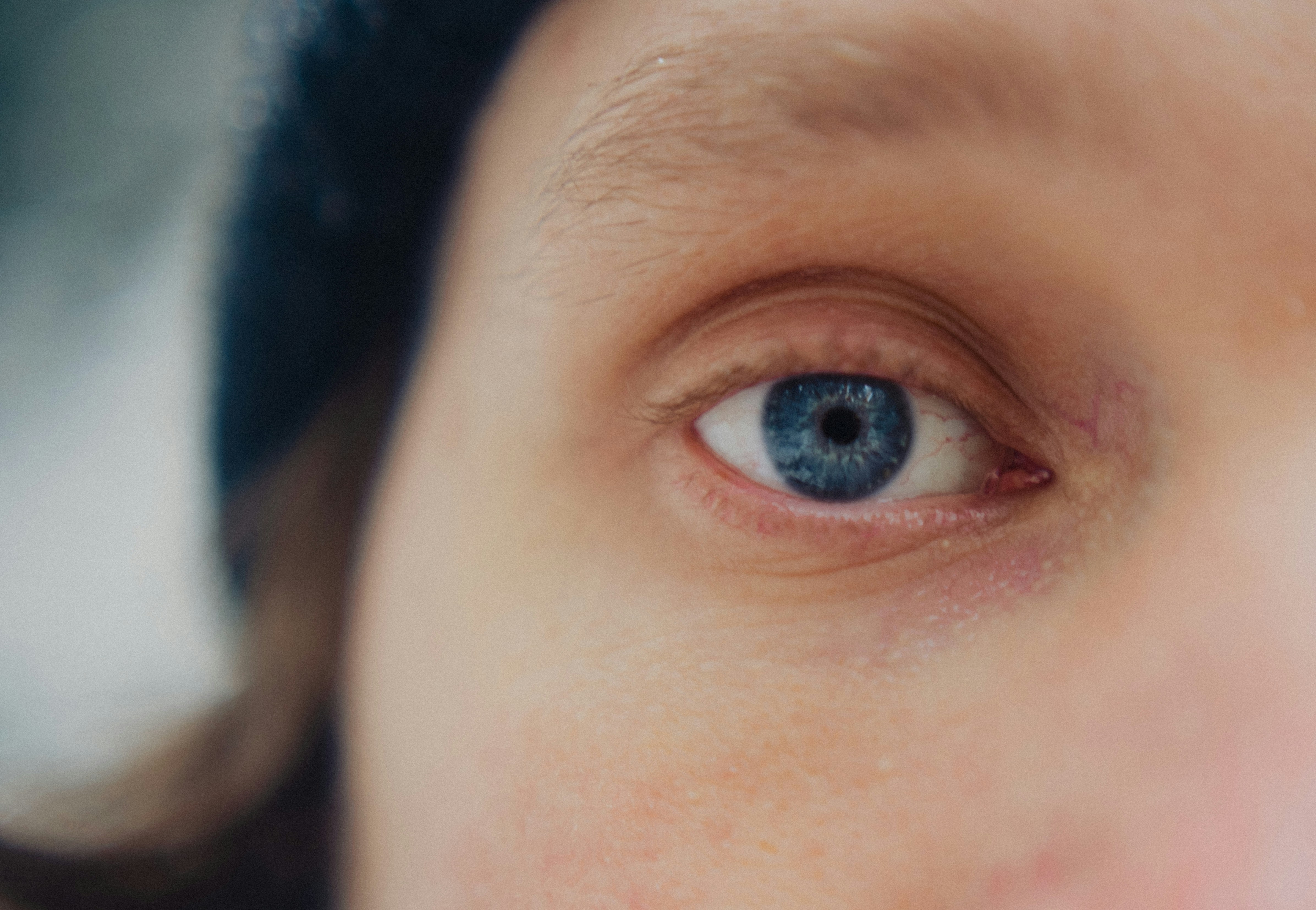 Close-up of a person's blue eye