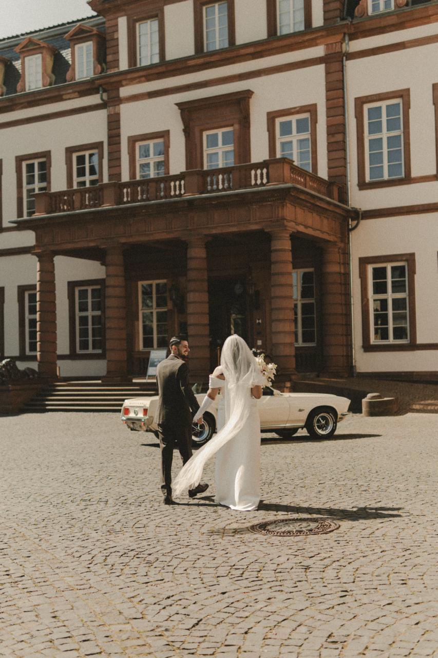 Fashion photoshoot with a woman posing in a dress