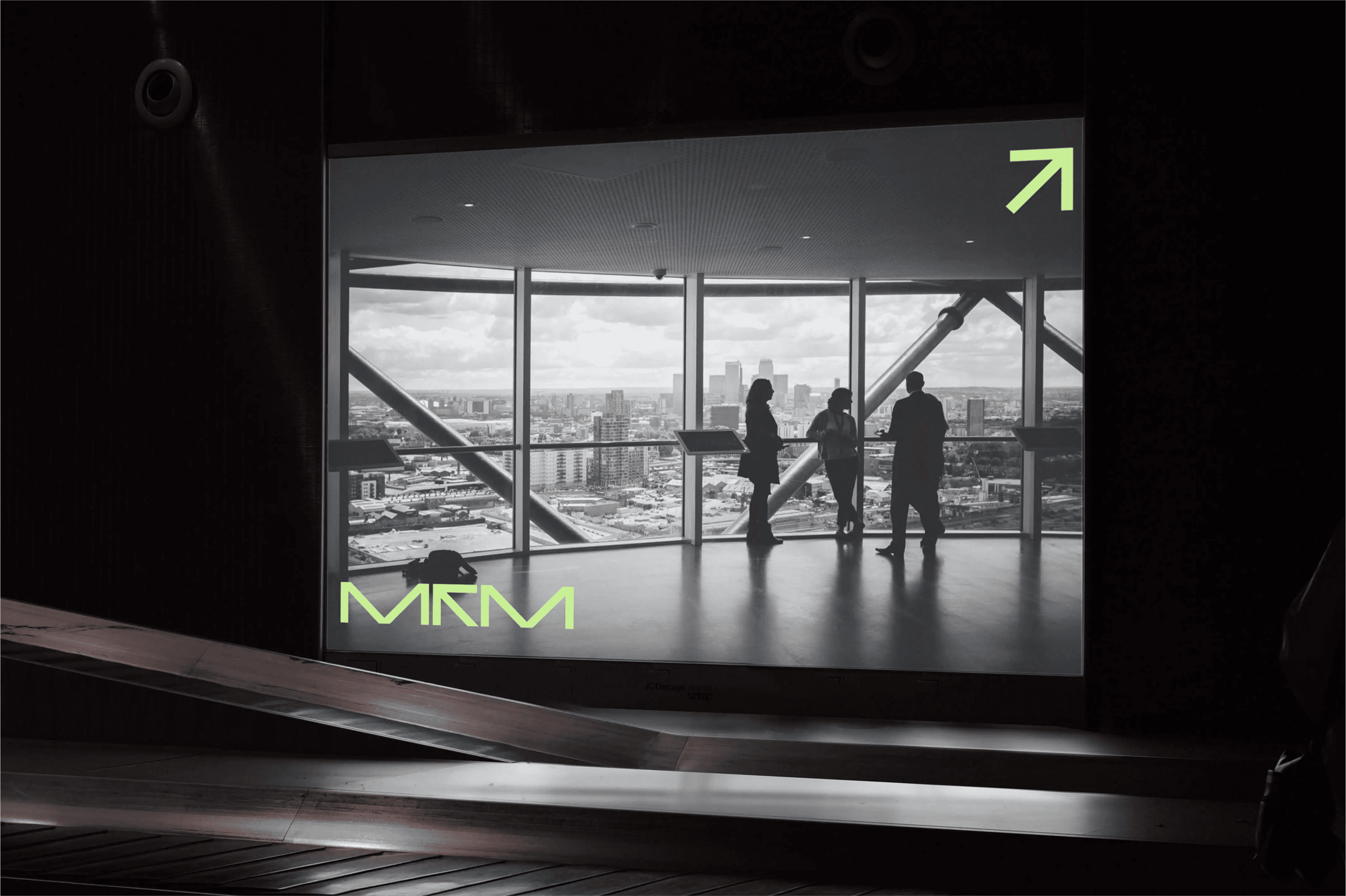 Silhouette of a person reflected on a building window