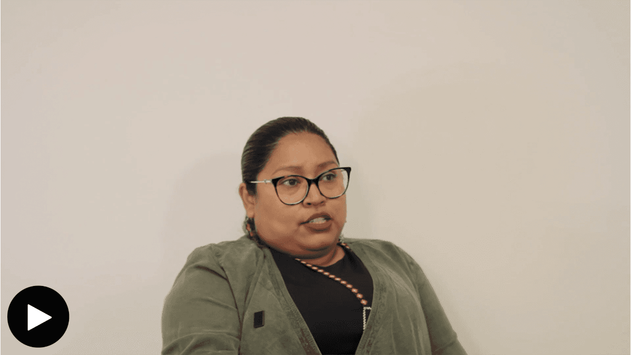 Image shows Cyndy García Weyandt talking.