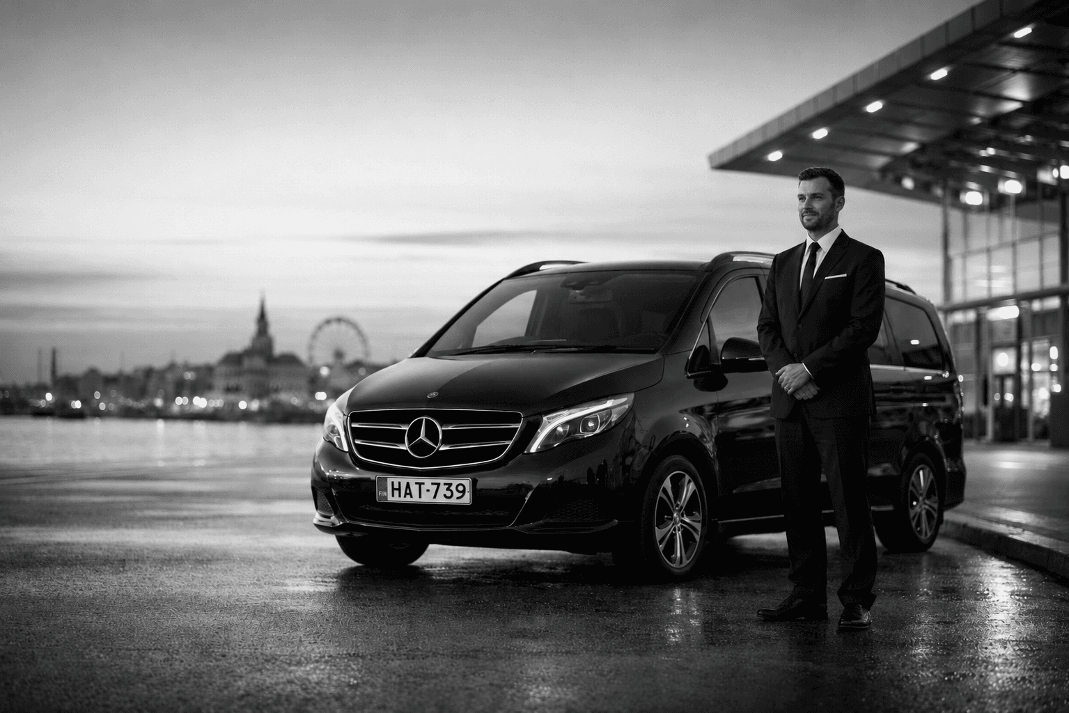 Helsinki Airport terminal at night — private transfer service