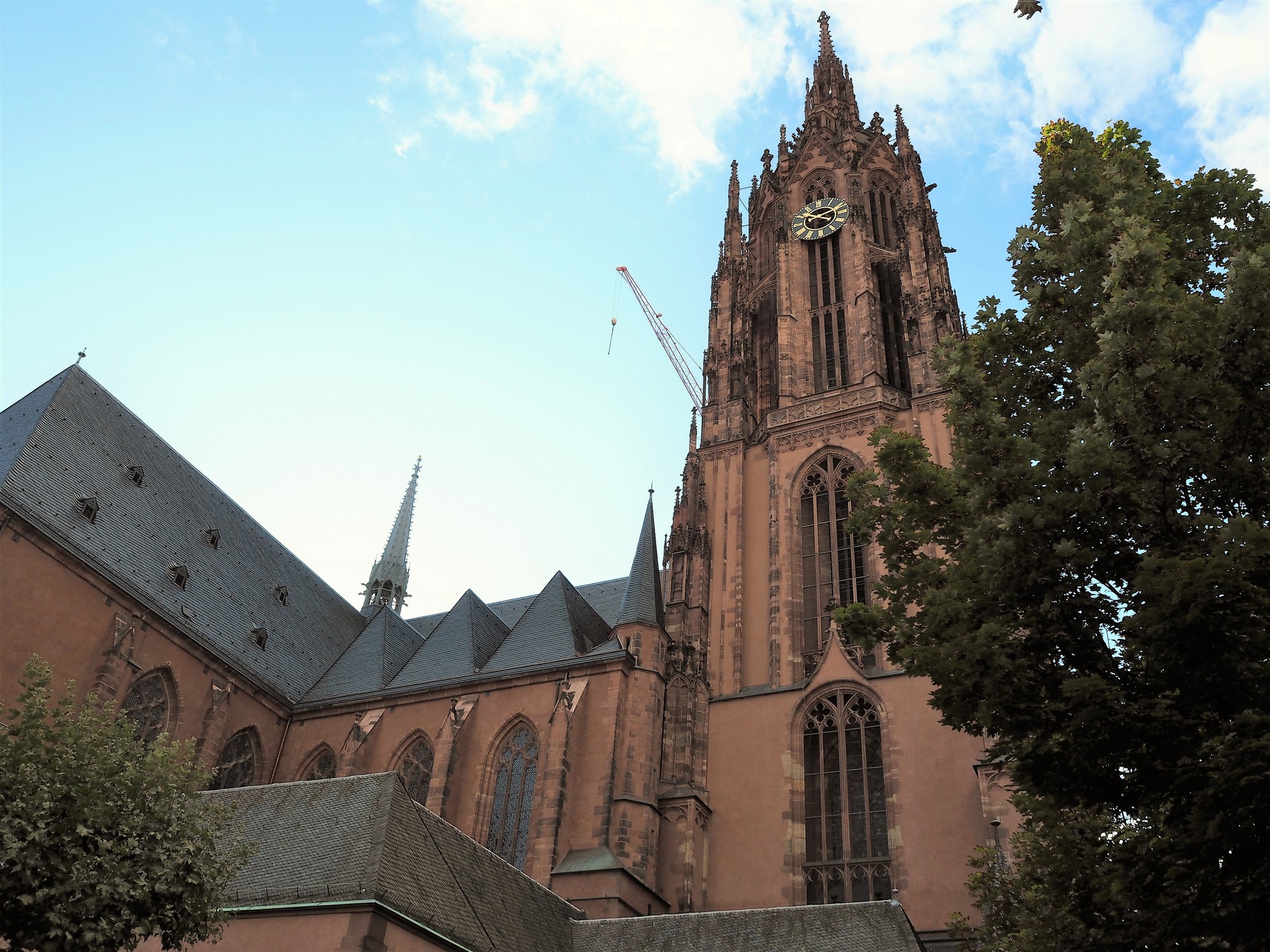 A tall building with a clock on the top of it