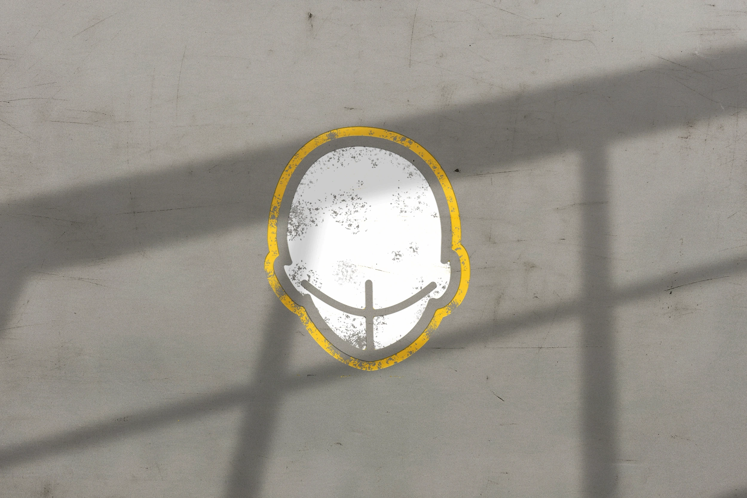 A close-up of a hand wearing multiple decorative rings against a blue background.