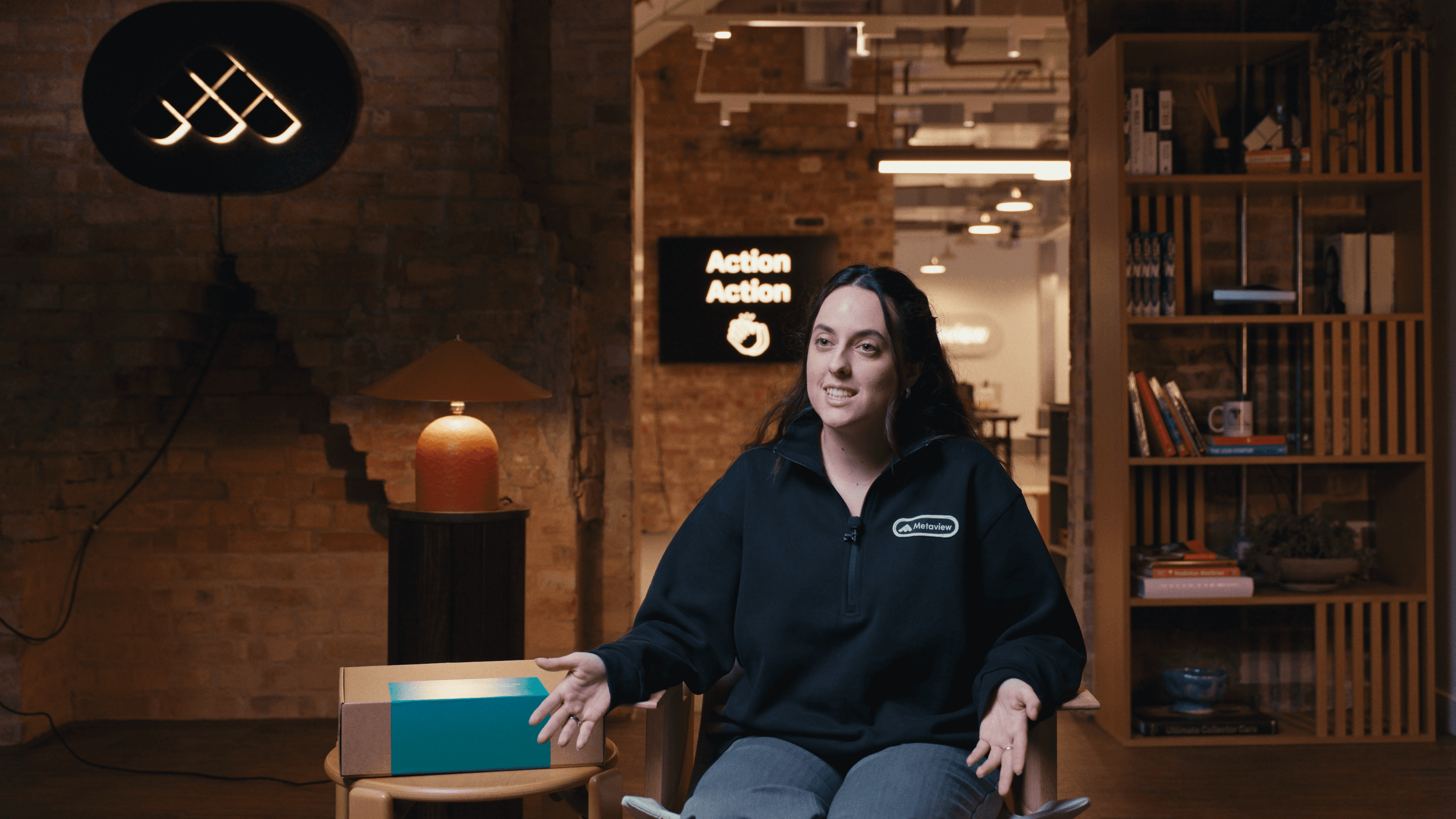 Violeta sitting wearing Metaview apparel