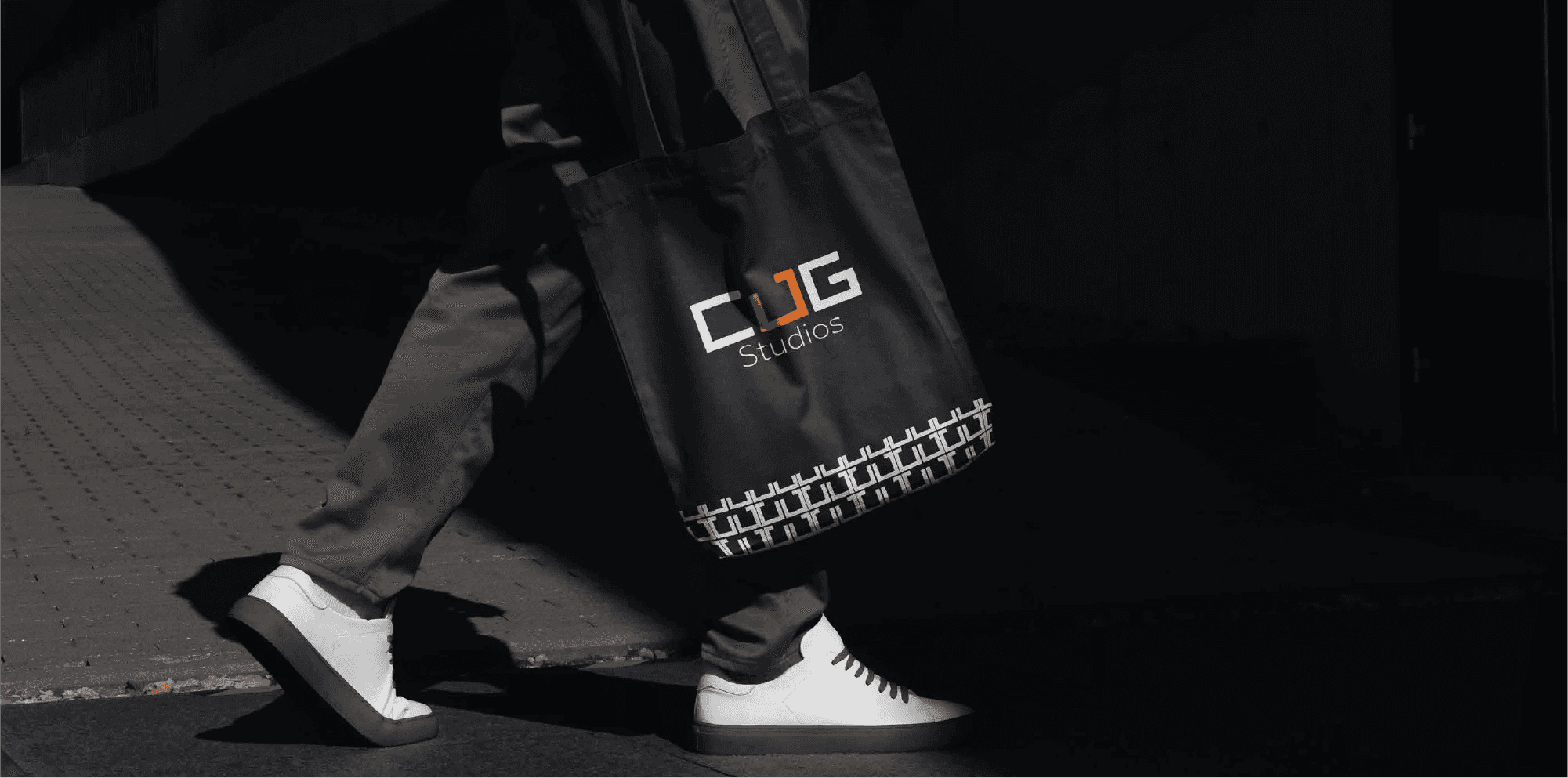 a black cellphone with a white letter on it