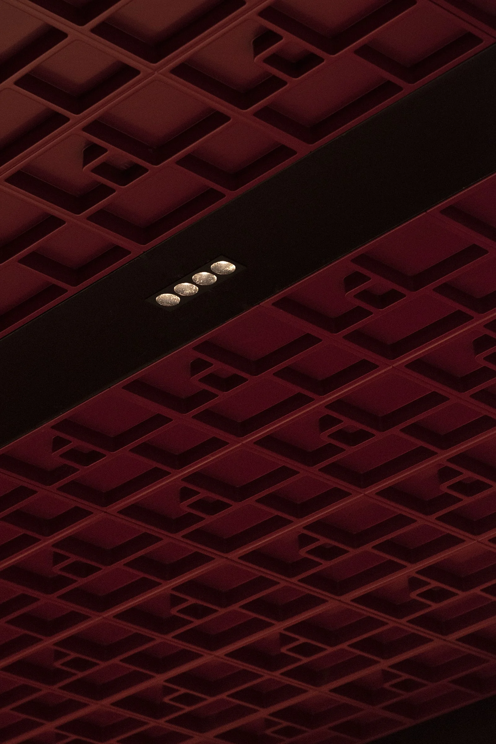 A vintage race car with blue, orange, and white livery