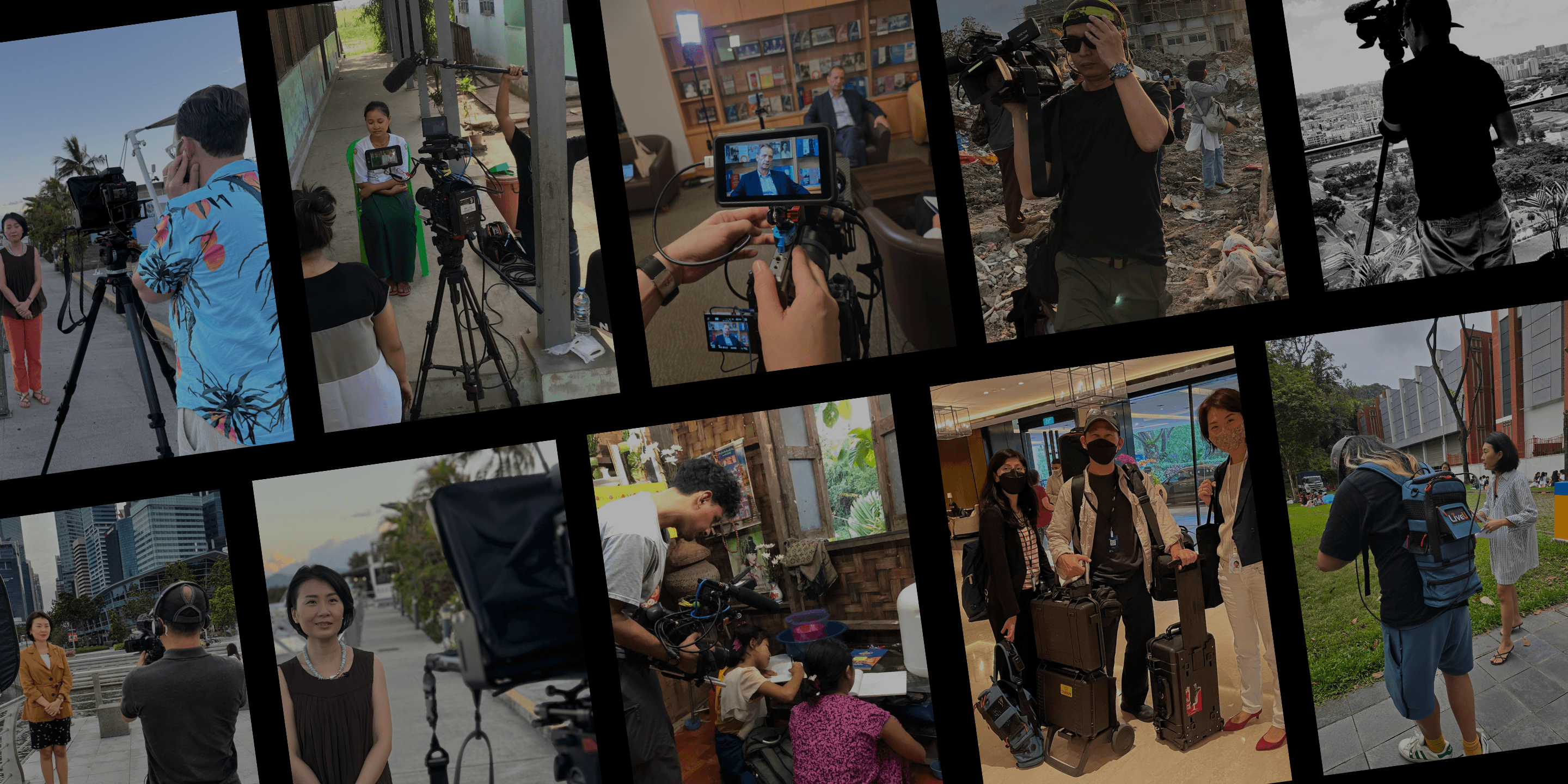 Formula 1 team members walk past the f1 logo.