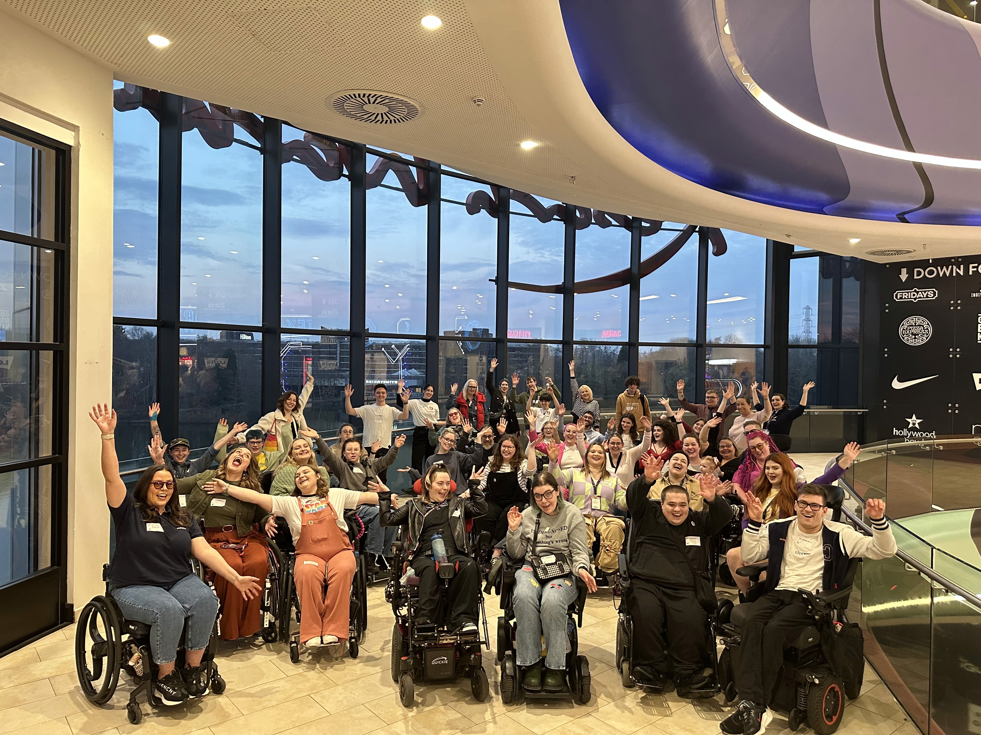 Sociability users with different disabilities celebrate at Naidex conference.