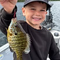 Young angler learning on a guided fishing trip