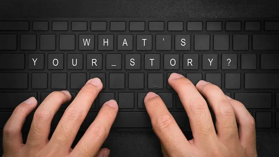 Hands typing on a black keyboard with the phrase "WHAT'S YOUR STORY?" prominently displayed, emphasizing client-centered storytelling in financial planning.