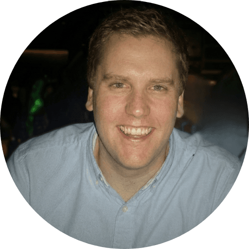 A person wearing the white shirt looking at the left