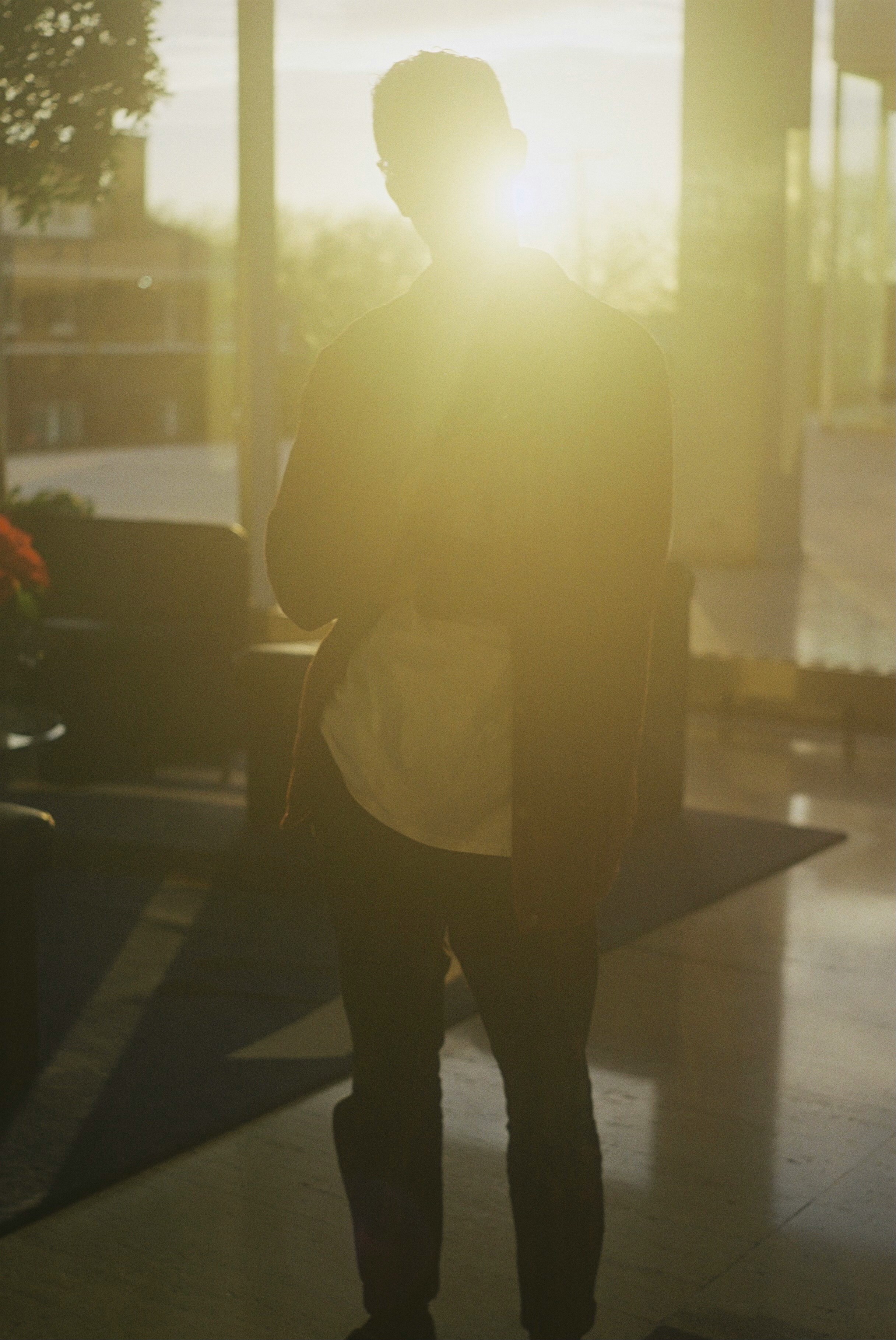 man in black jacket standing