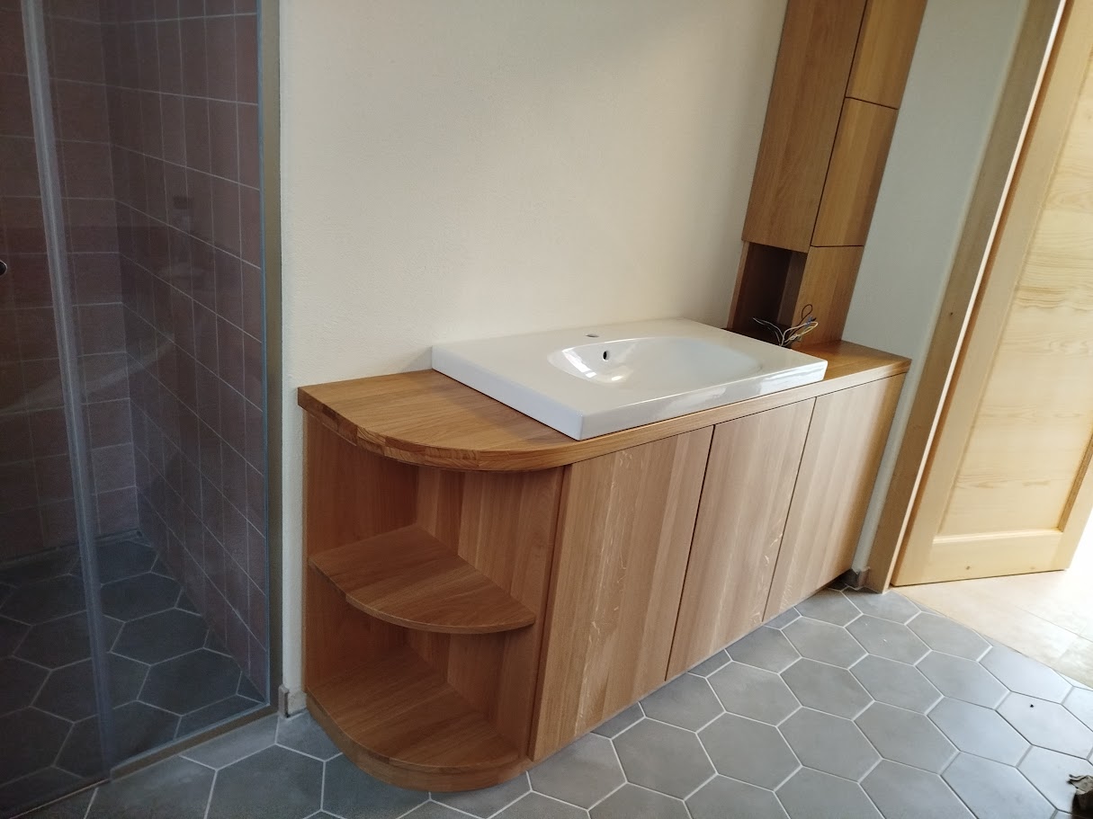 man standing infront of miter saw