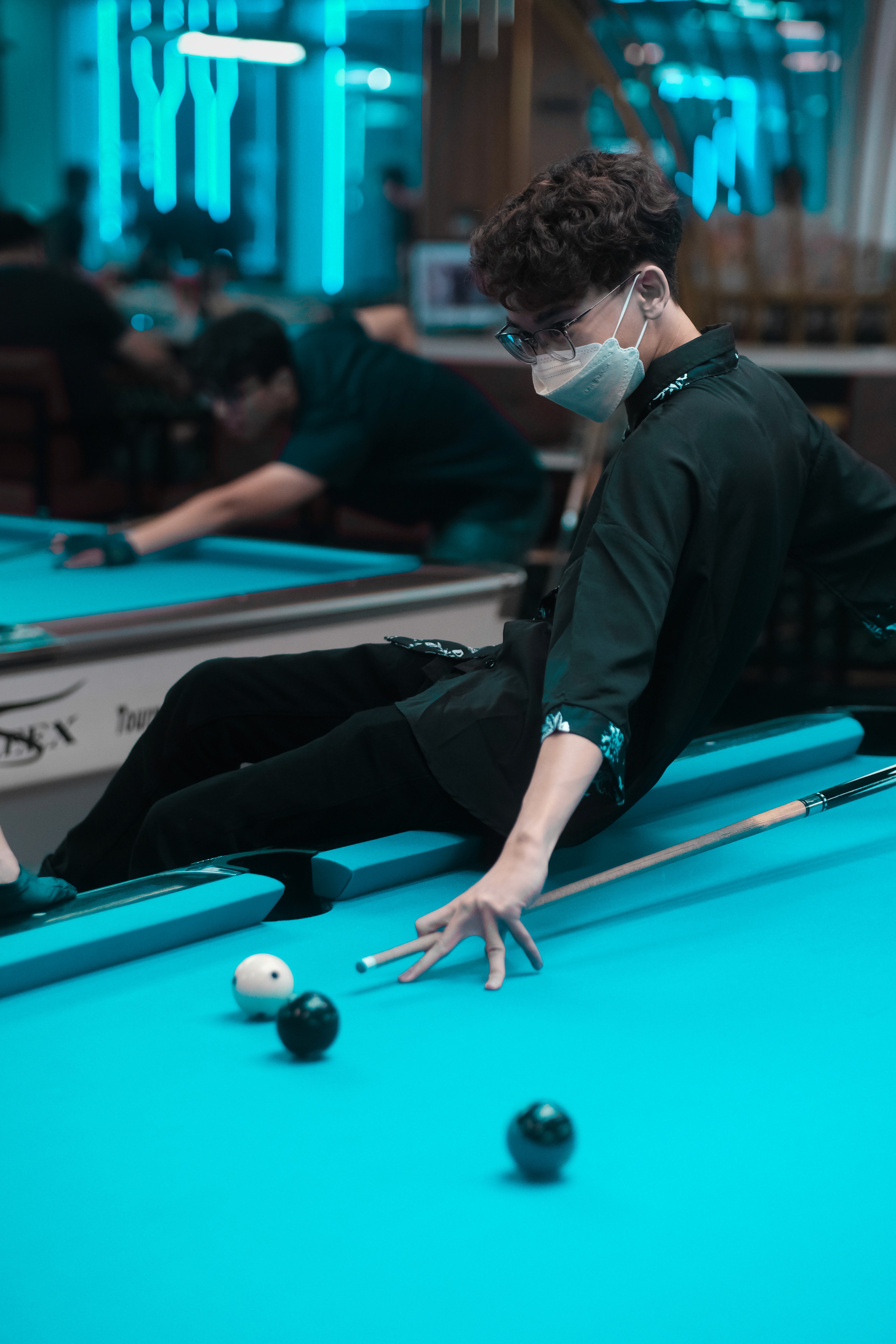 a woman holding a red flower