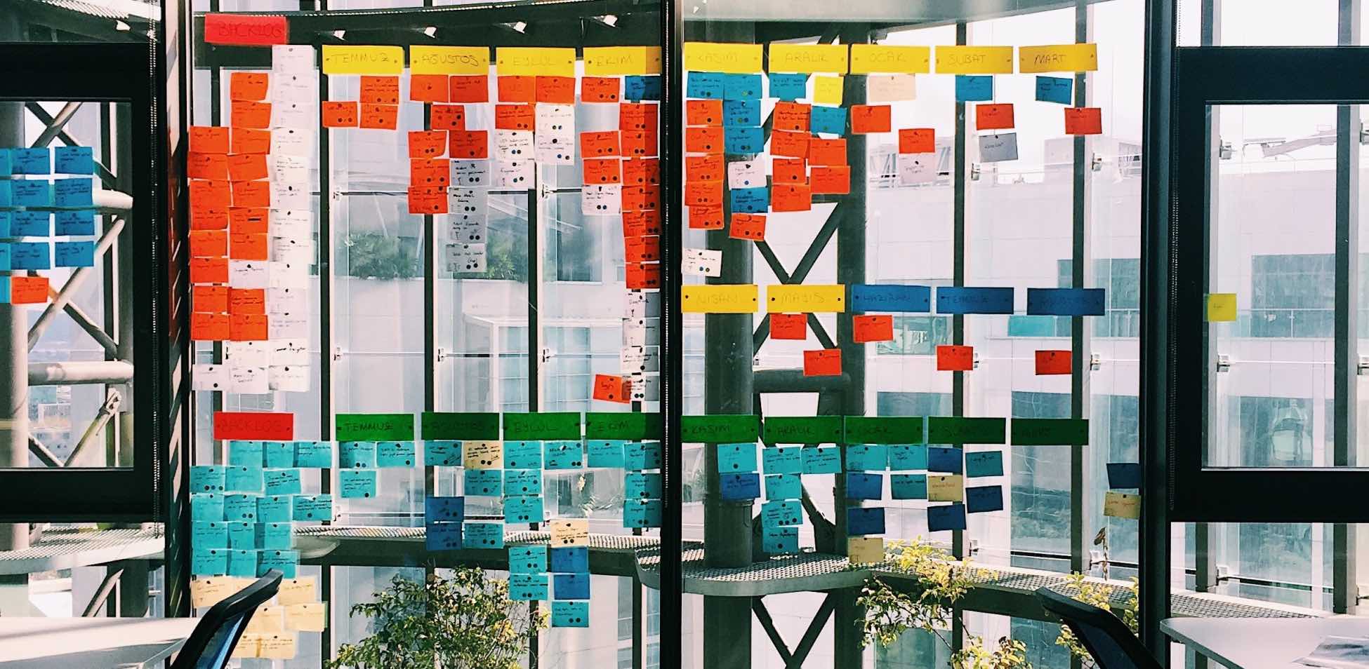 A colorful wall with many bright and colorful decorations.