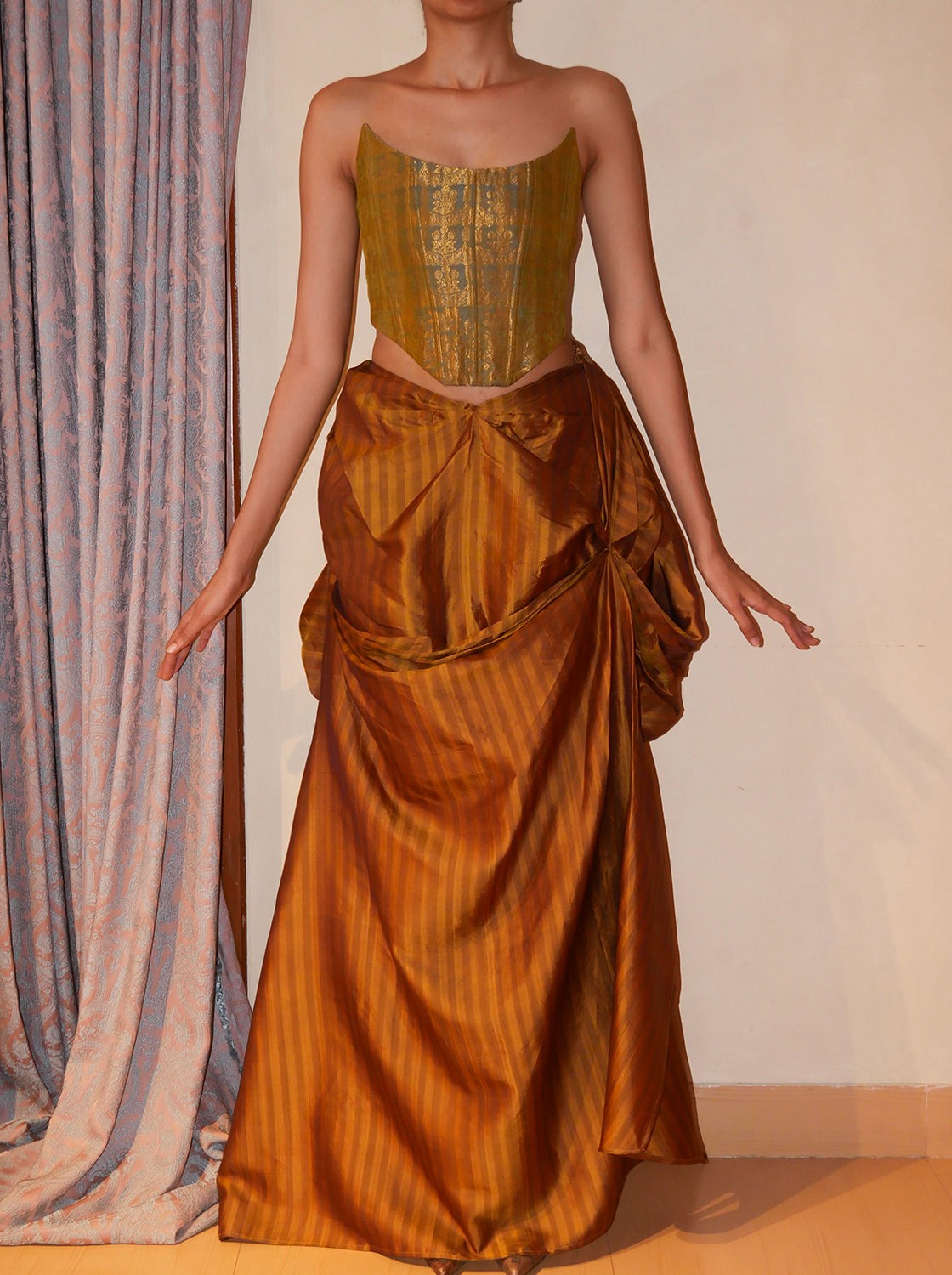 Guljhaam, is our one of a kind skirt, handcrafted by skilled artisans, in house using vintage silk saree, celebrating elegance and ease.