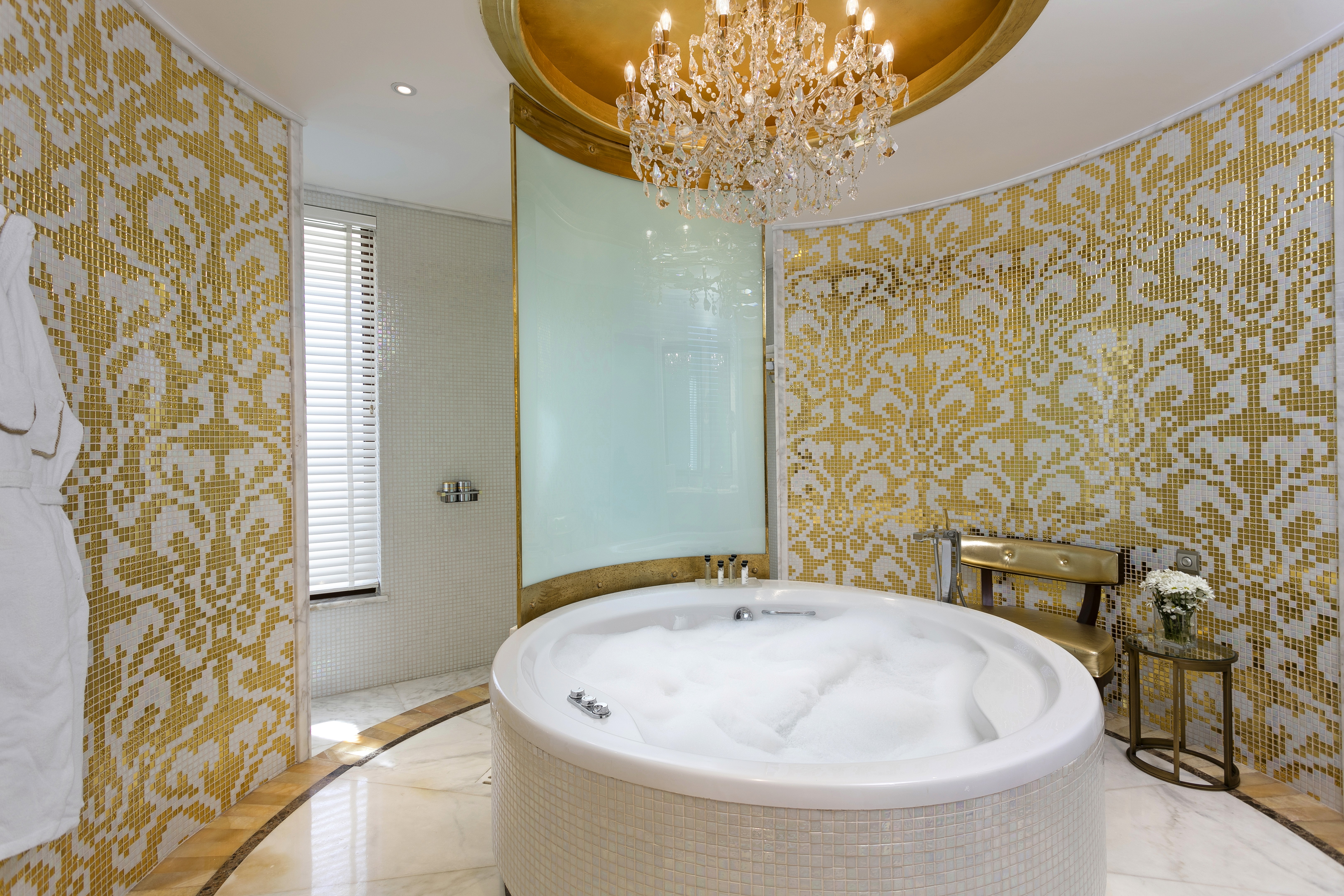 Luxurious bathroom featuring a jacuzzi, premium finishes, and a spa-inspired design for complete indulgence.