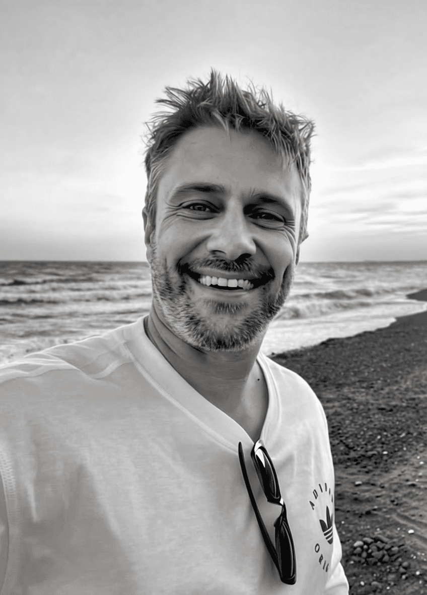 man in black knit cap and black framed eyeglasses