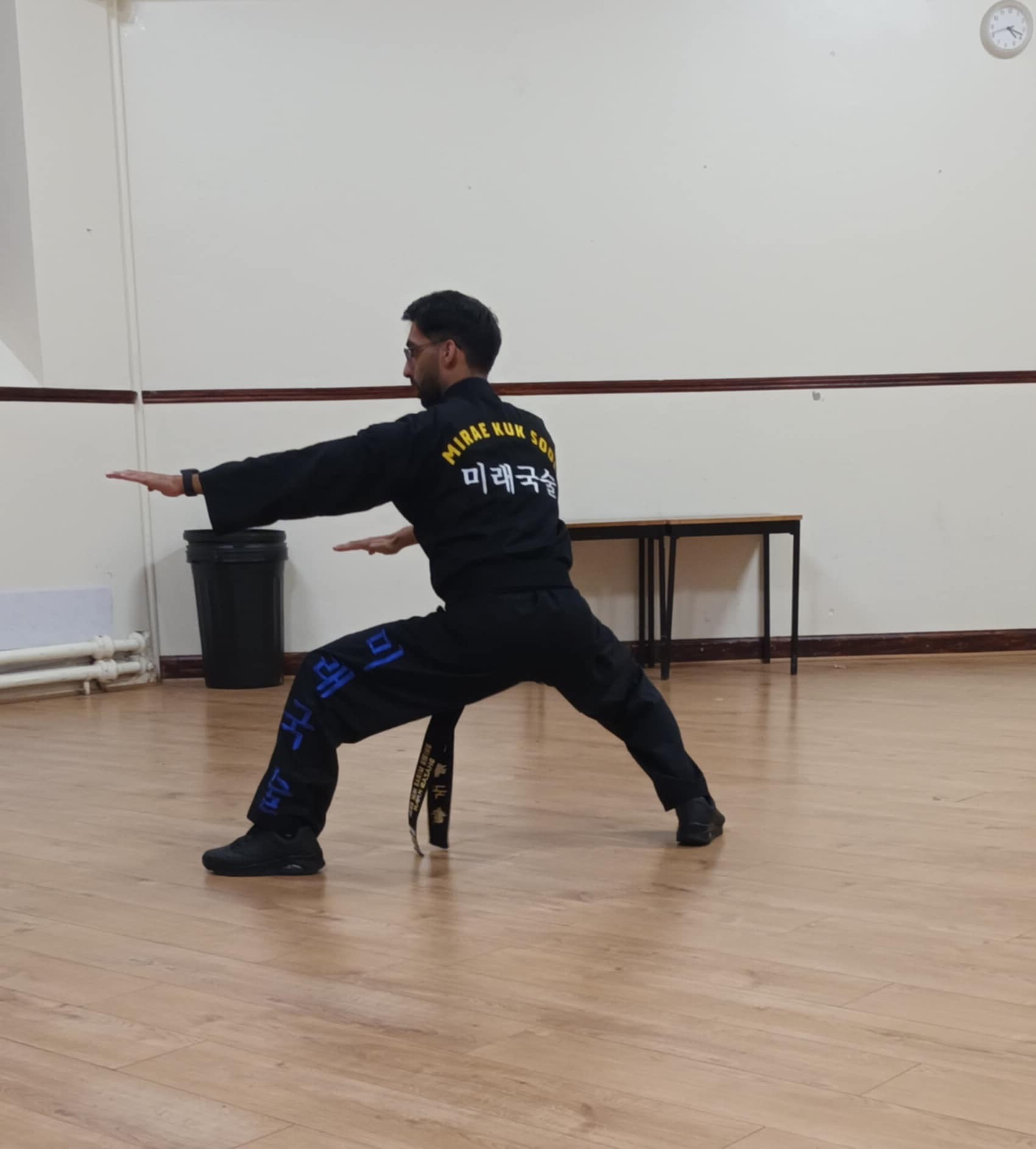 Head instructor Shaz holding a martial arts stance