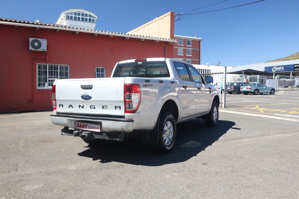 man in white crew neck shirt wearing black framed eyeglasses