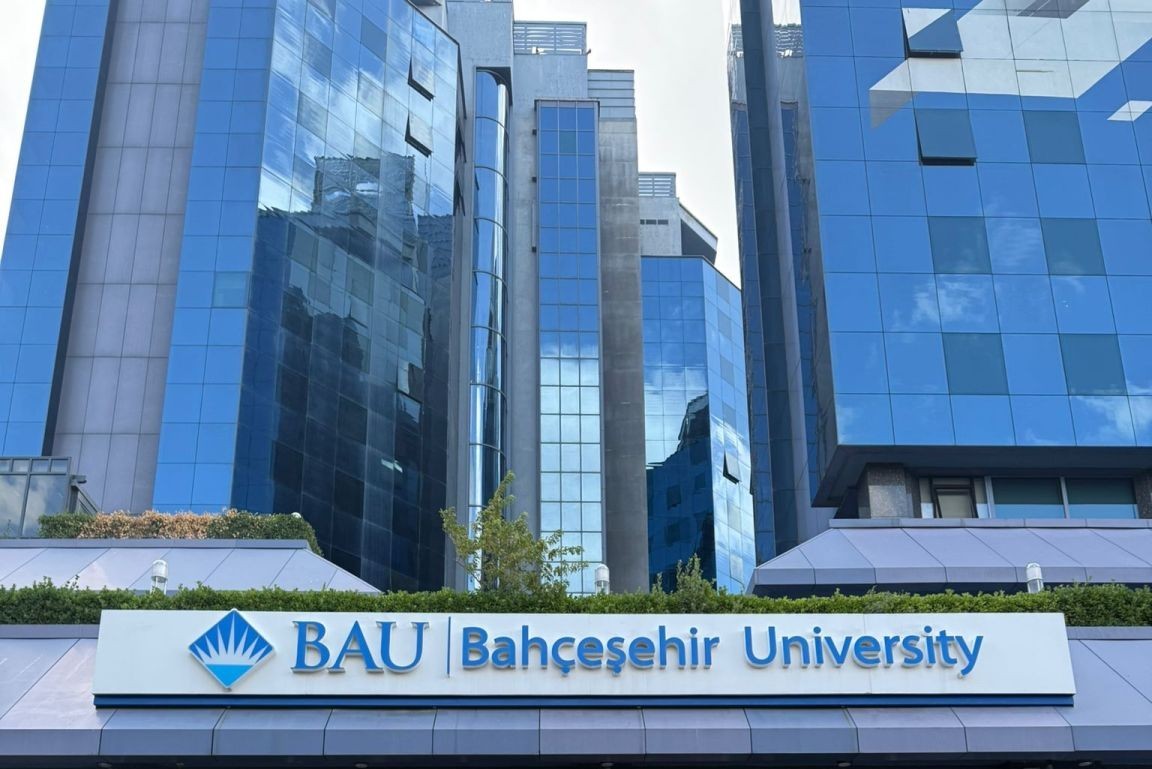 person writing on white paper