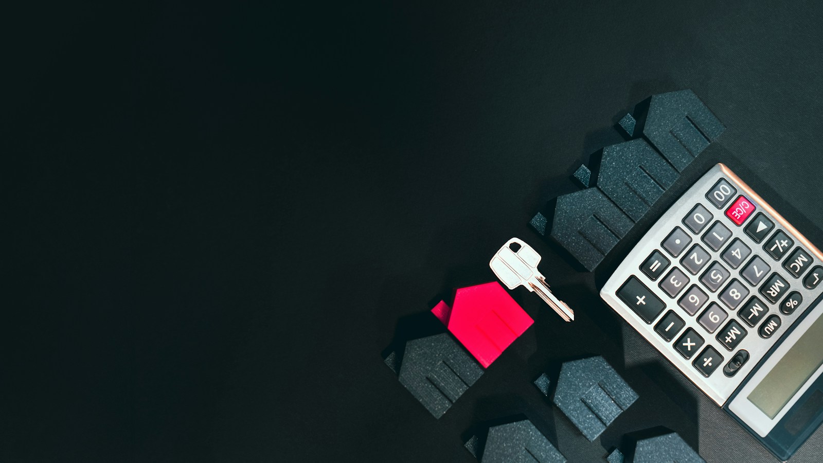Rental property key, calculator, and house model