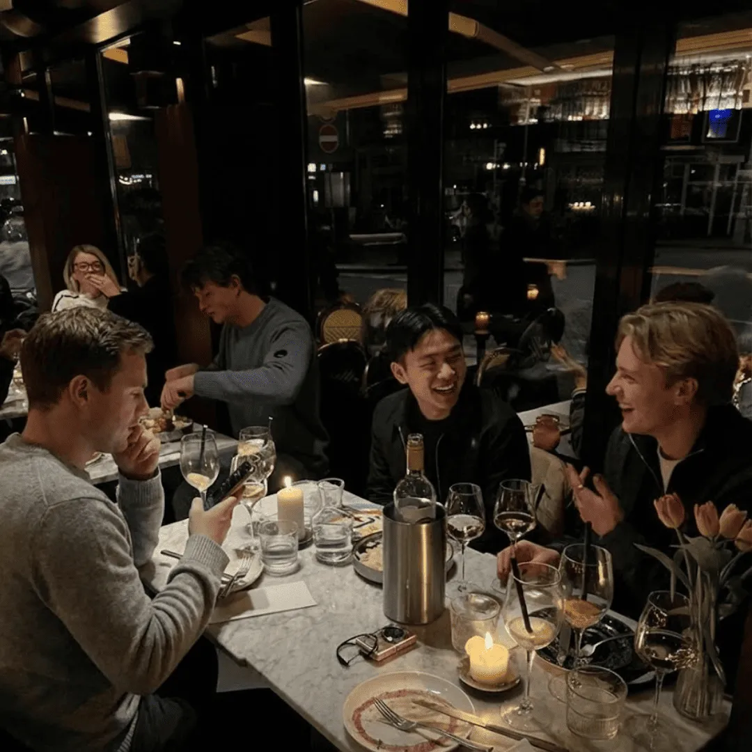 3 young men at a Mingleo dinner