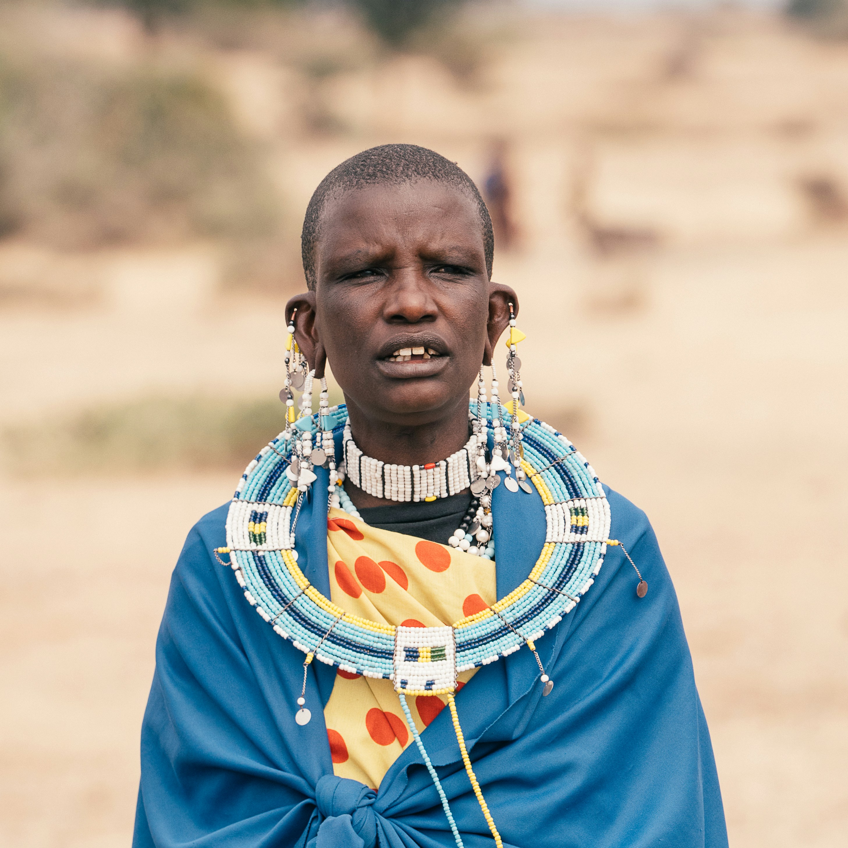 man in blue and red zip up jacket