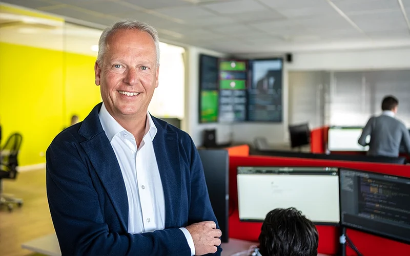 Picture of Robin Jongkind standing in his office