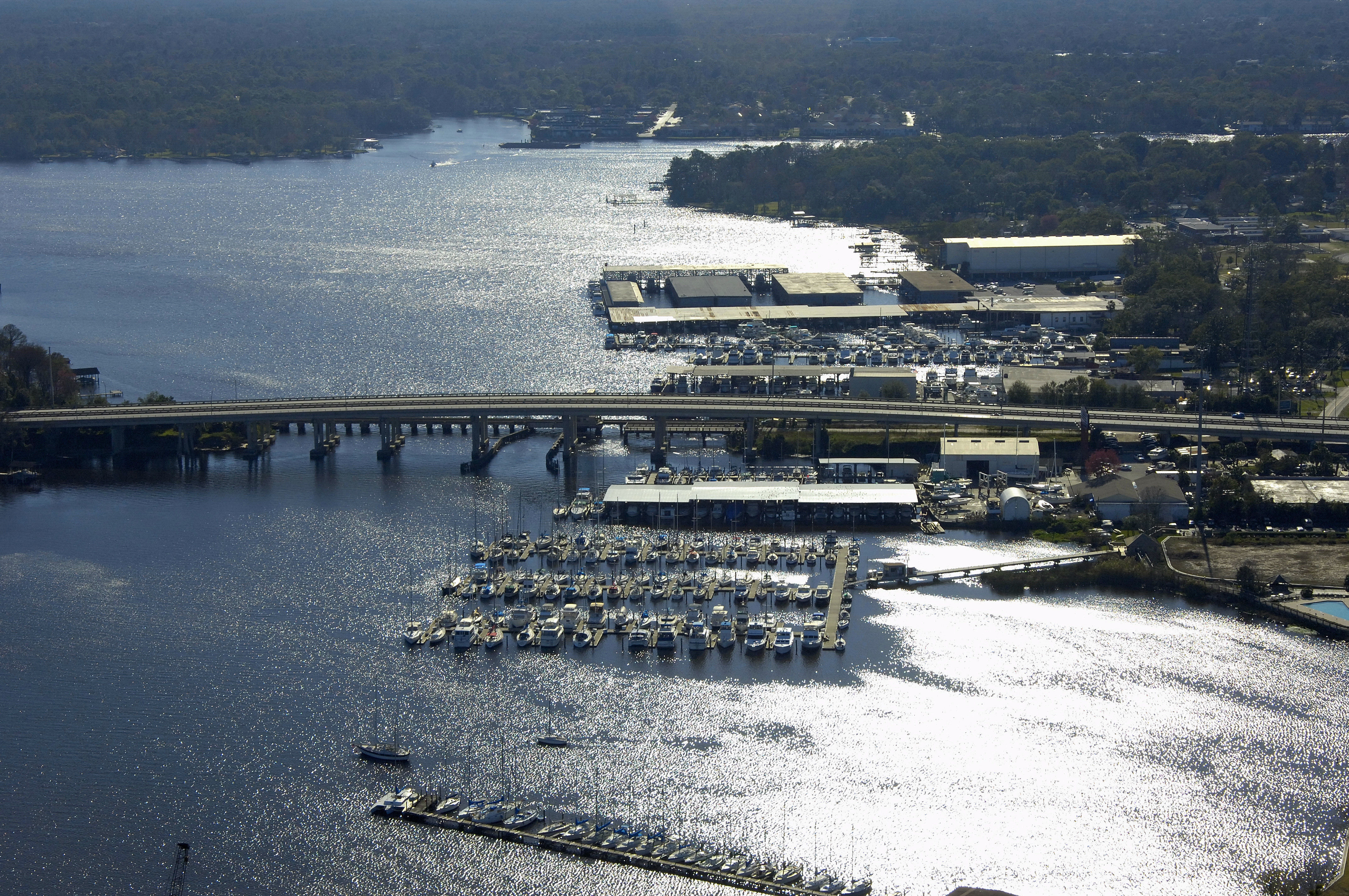 arial view of docks and bridge at sadler point marina
