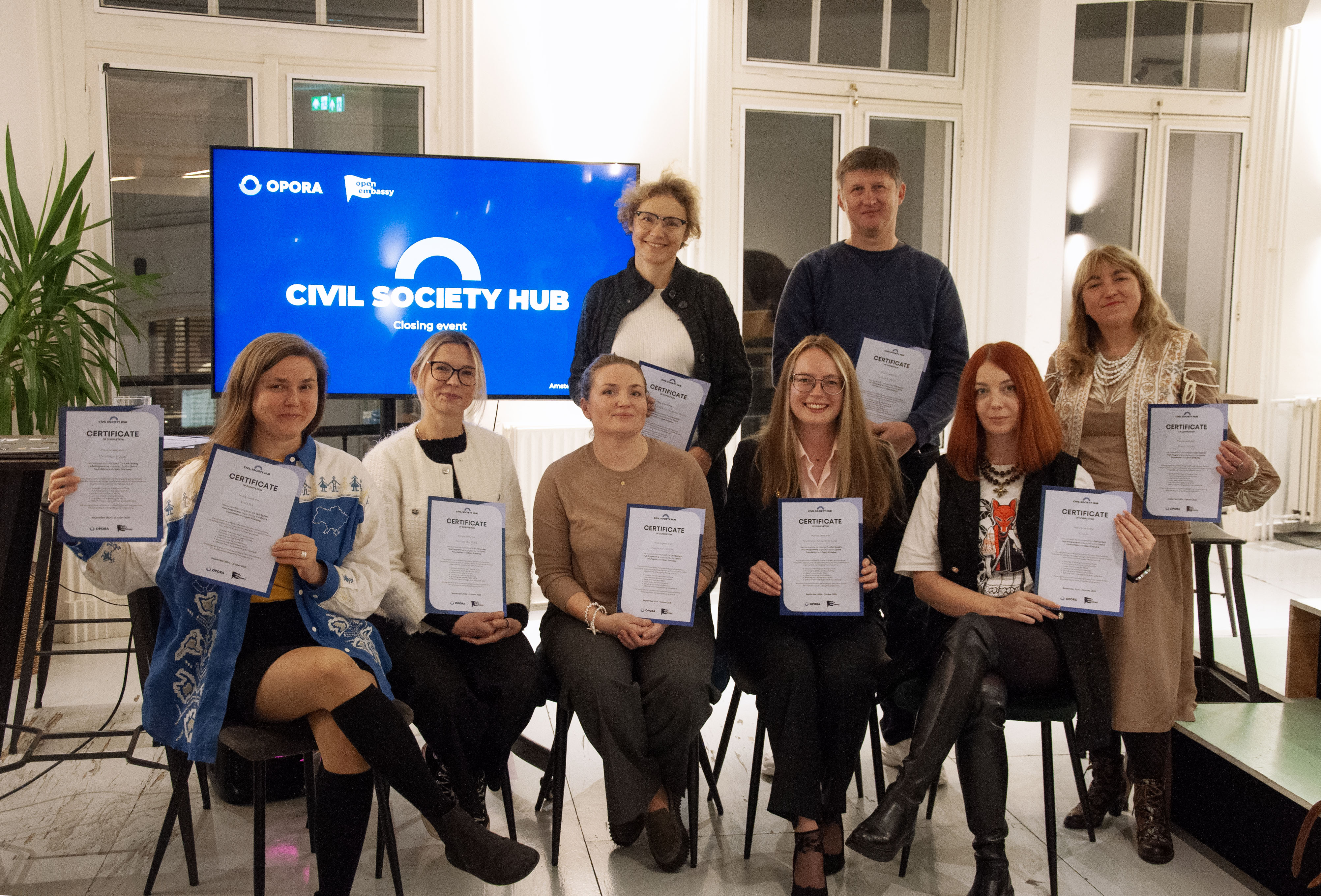 Portrait of Tetiana Seliutina with OPORA Foundation branding, featured in the People of OPORA series.