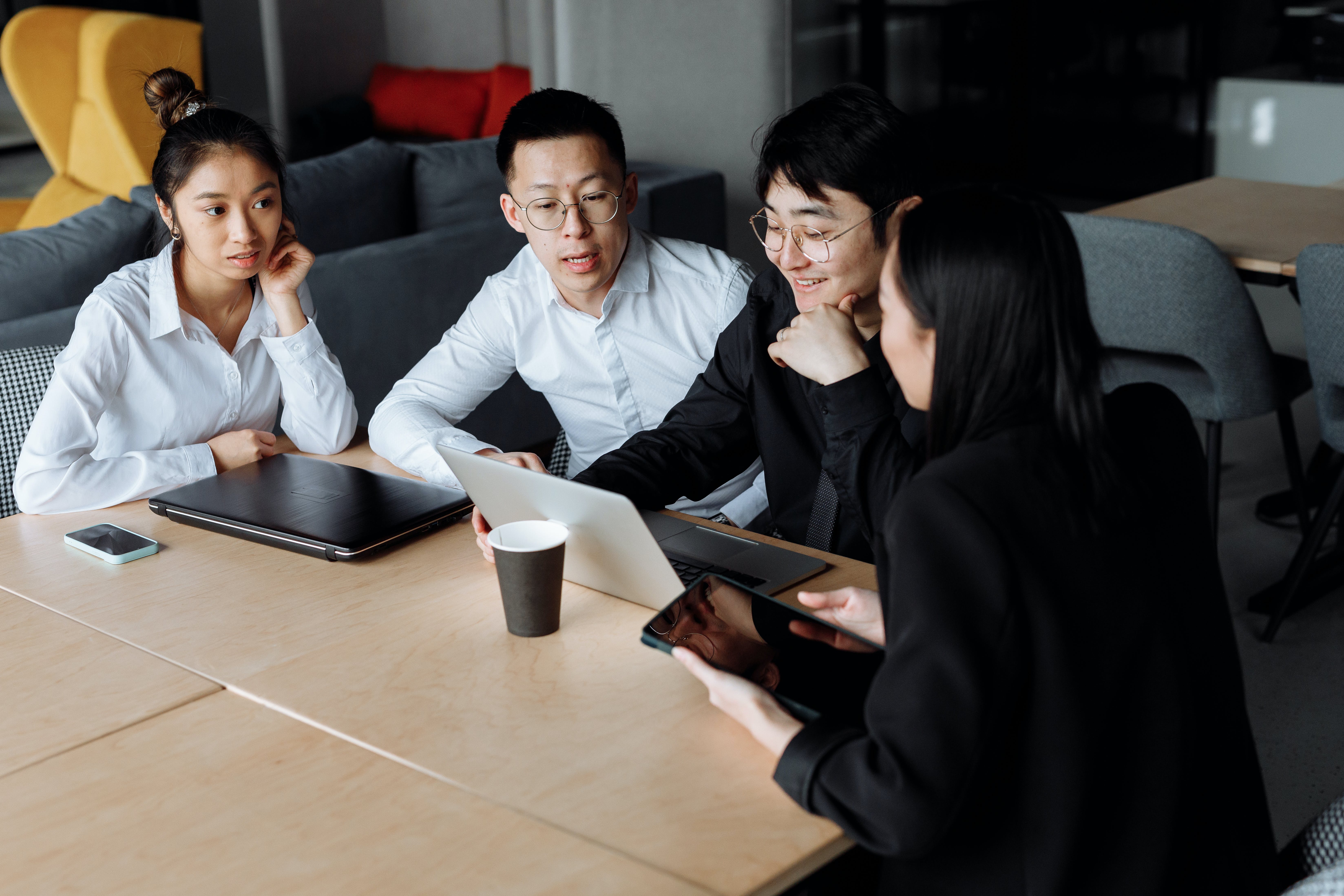 Group of people talking about mortgage broker