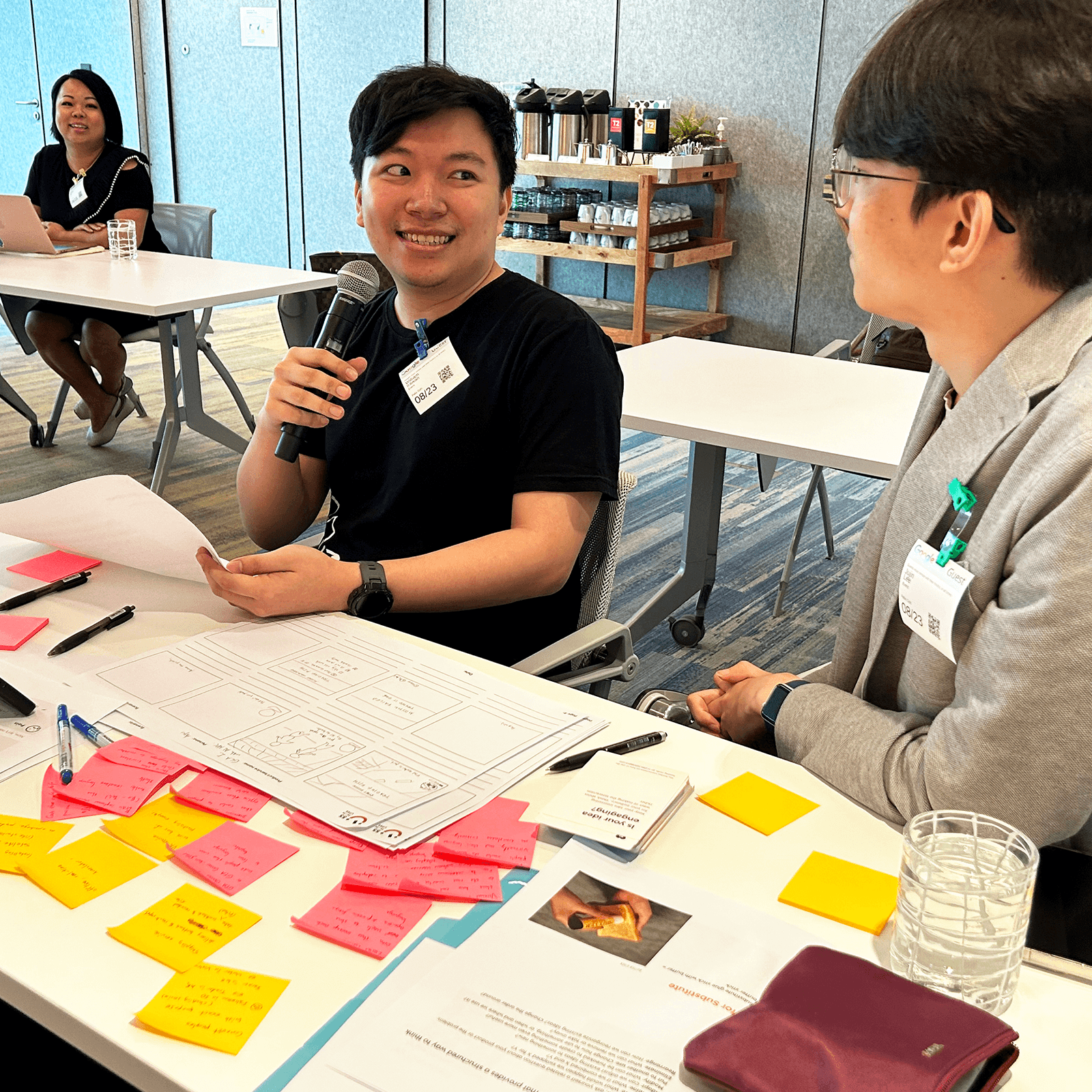 Two participants presenting their idea after a prototyping session