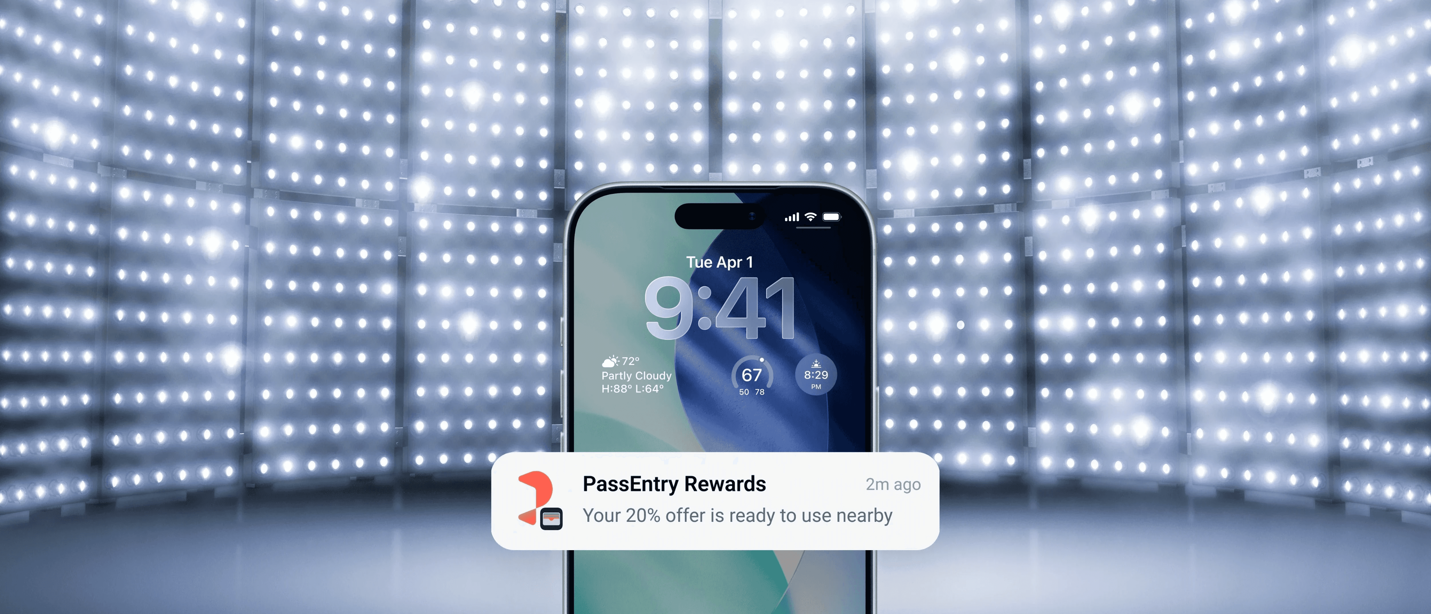 Smartphone lock screen showing a mobile wallet notification under a spotlight, representing high-engagement mobile wallet marketing.