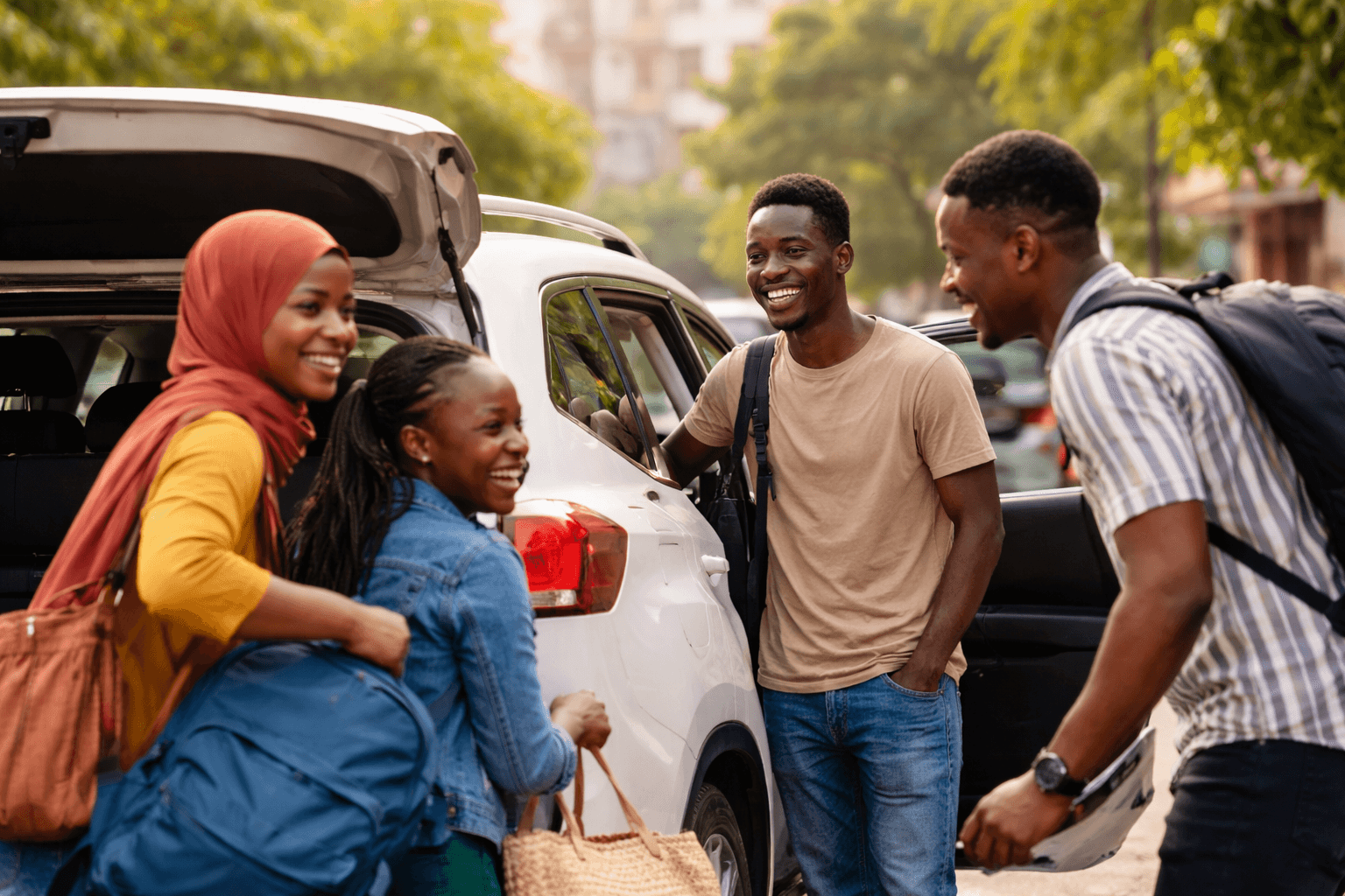 man standing behind flat screen computer monitor