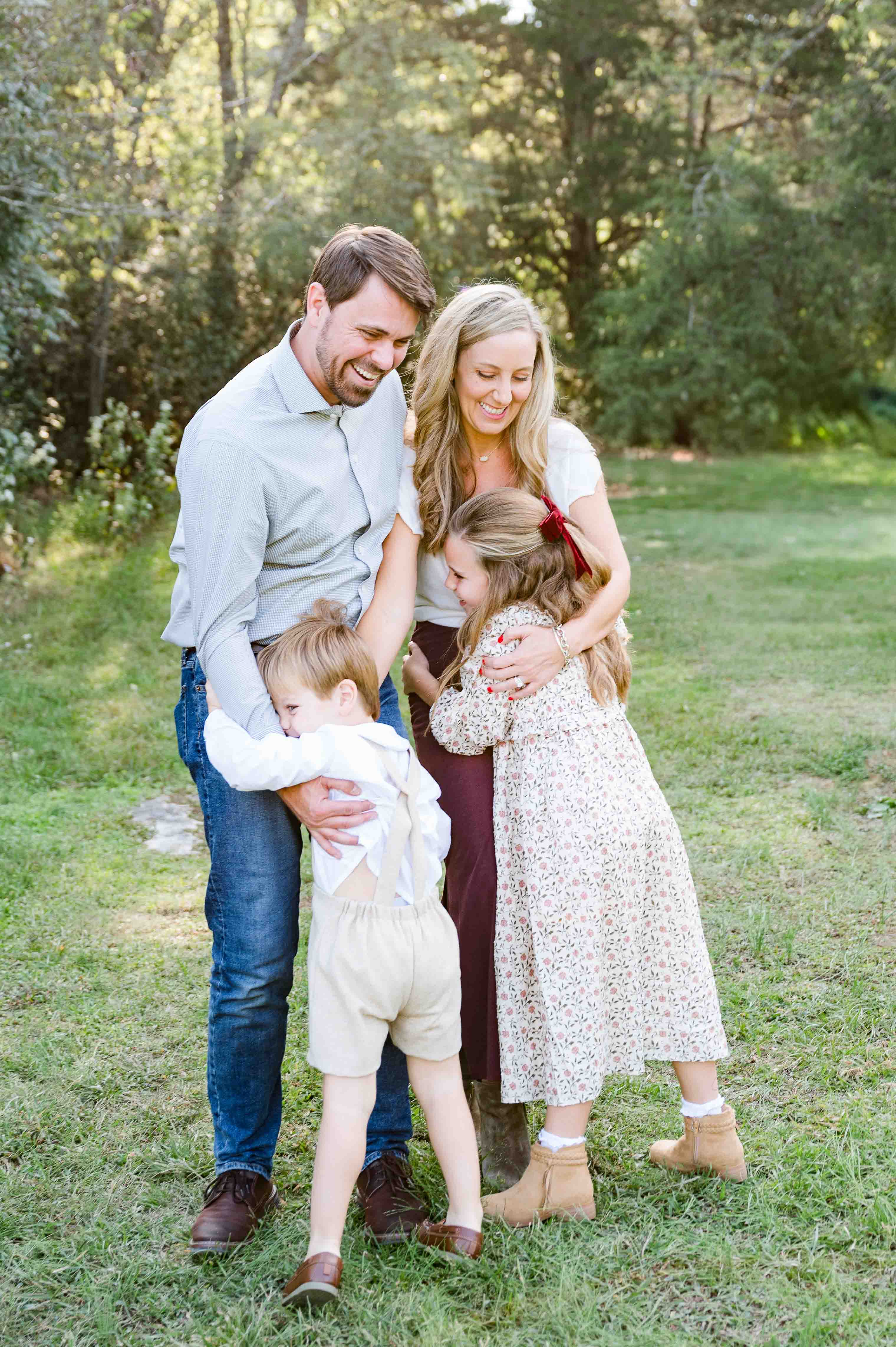 Family group hug during mini photography session in Nashville Tennessee.