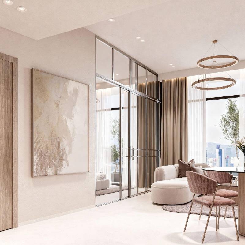 A modern living room featuring a dining table and chairs, designed by Cybele by Wadan.