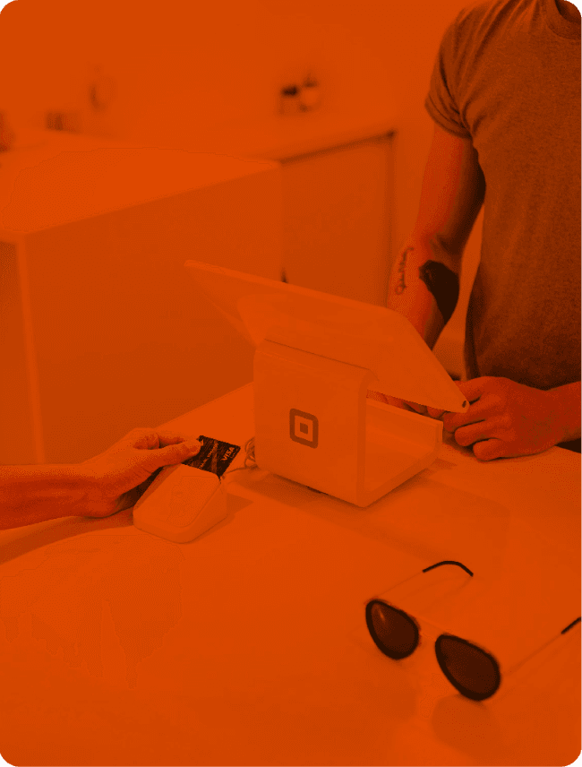 Barista preparing order behind a counter