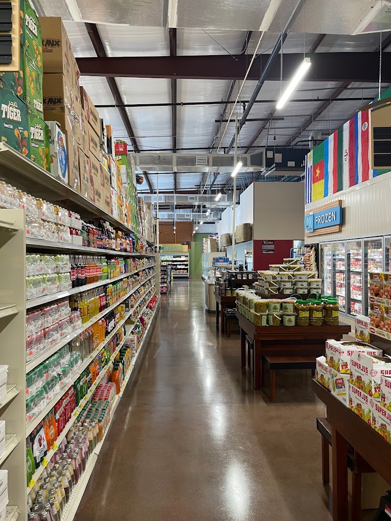 Aisle view of groceries, spices, and imported products at International Food Market Orlando, showcasing a diverse selection of Middle Eastern, Turkish, and South Asian food items.