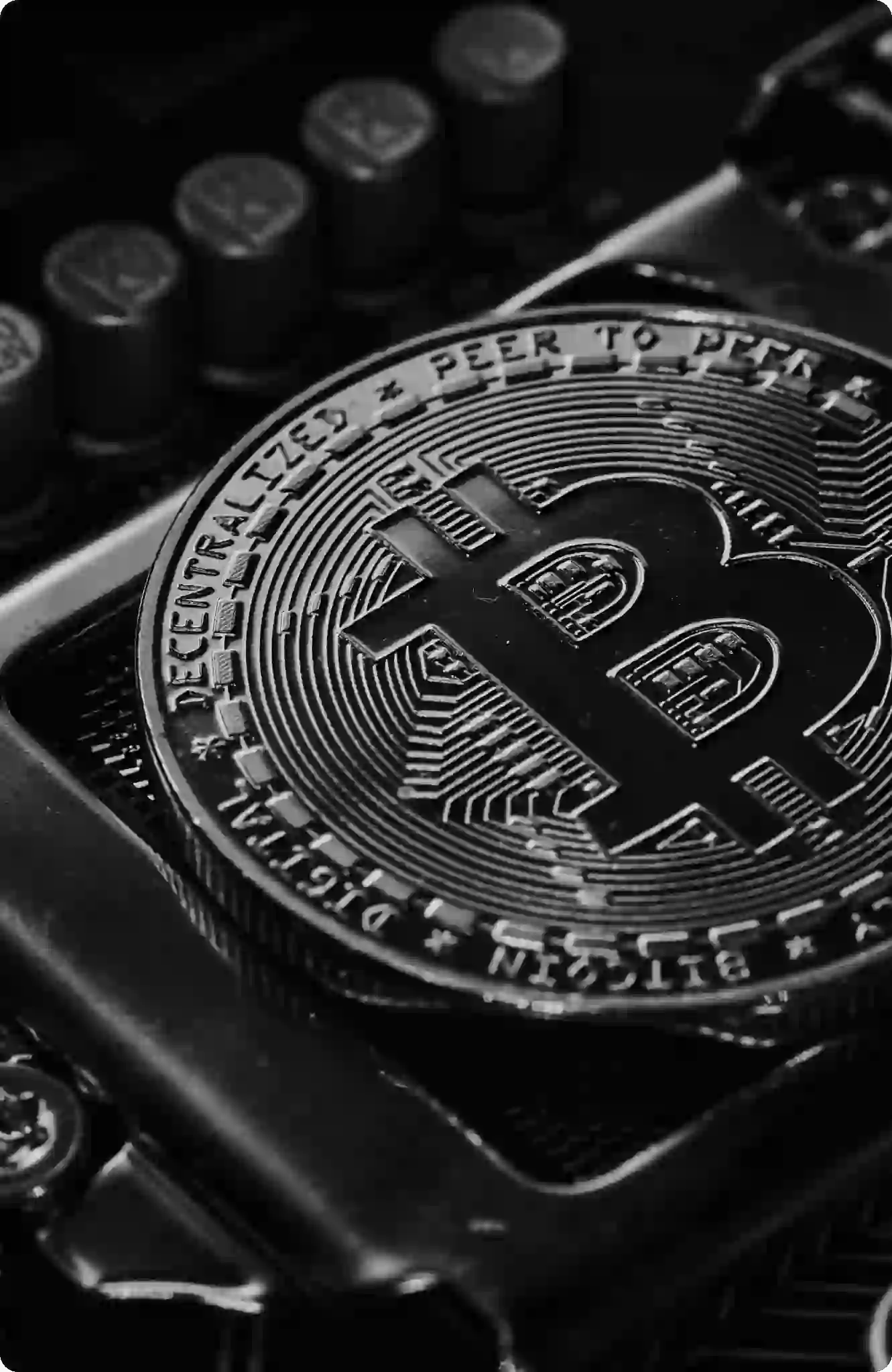 a bitcoin on top of a computer motherboard