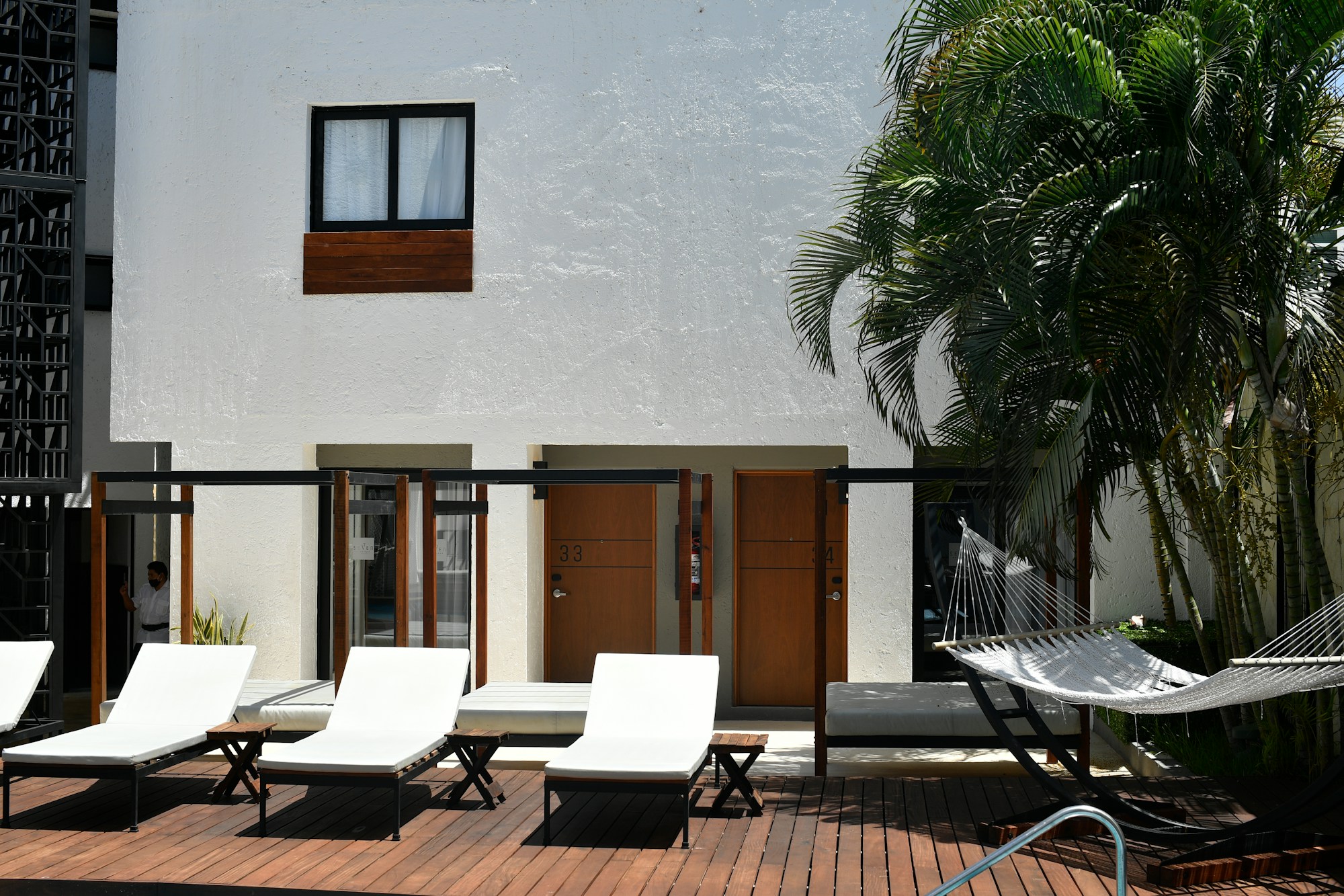 Boutique hotel deck with lounge chairs