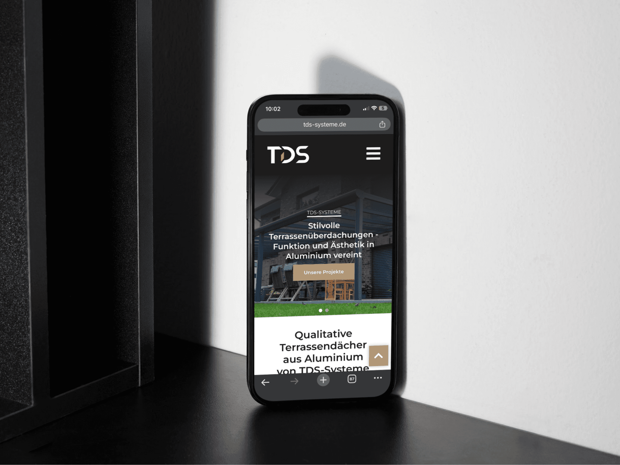 a cell phone on a ledge