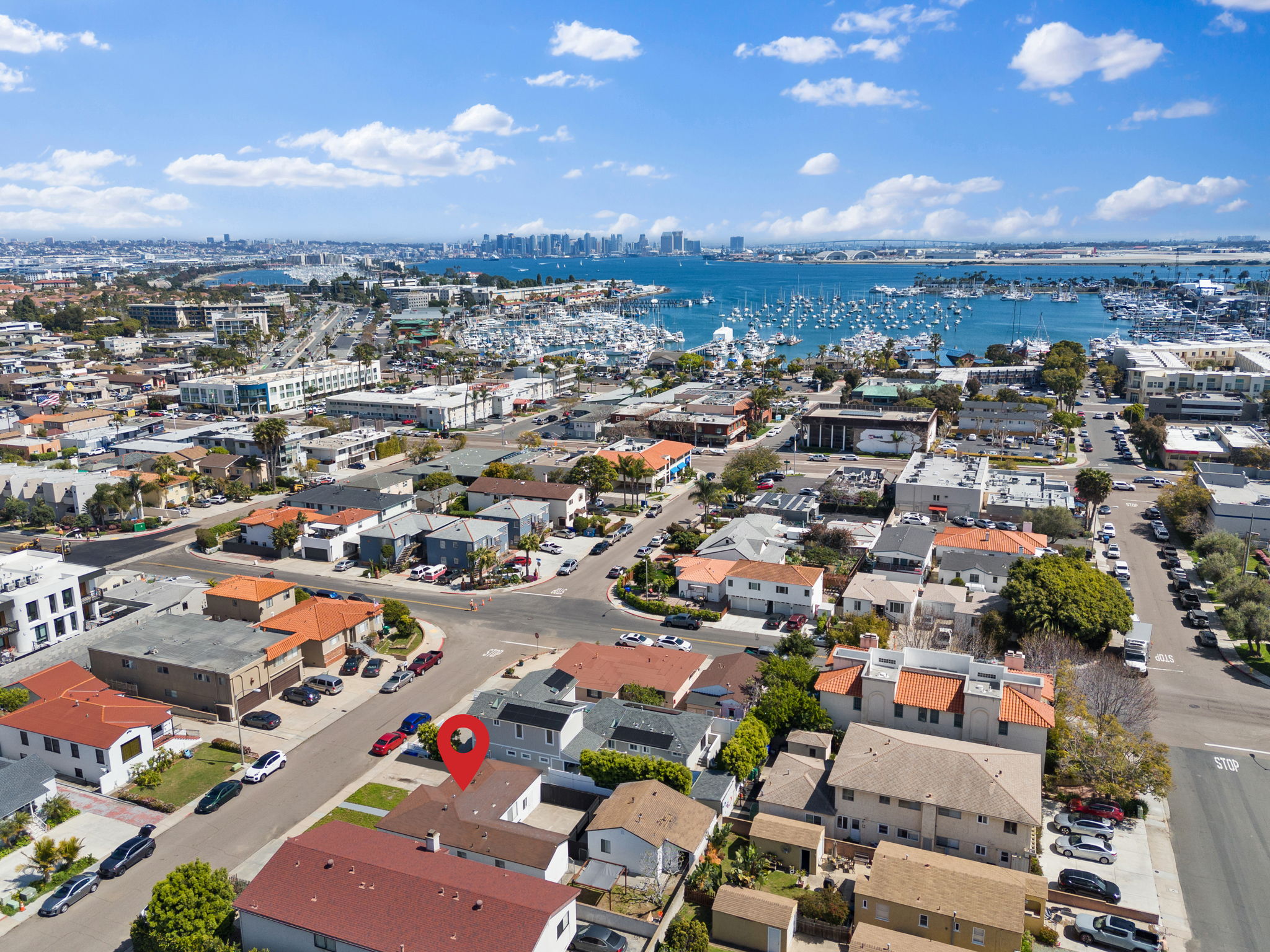  A wooden building sits by a misty lake, with a forest on the opposite shore. The building is reflected in the water.