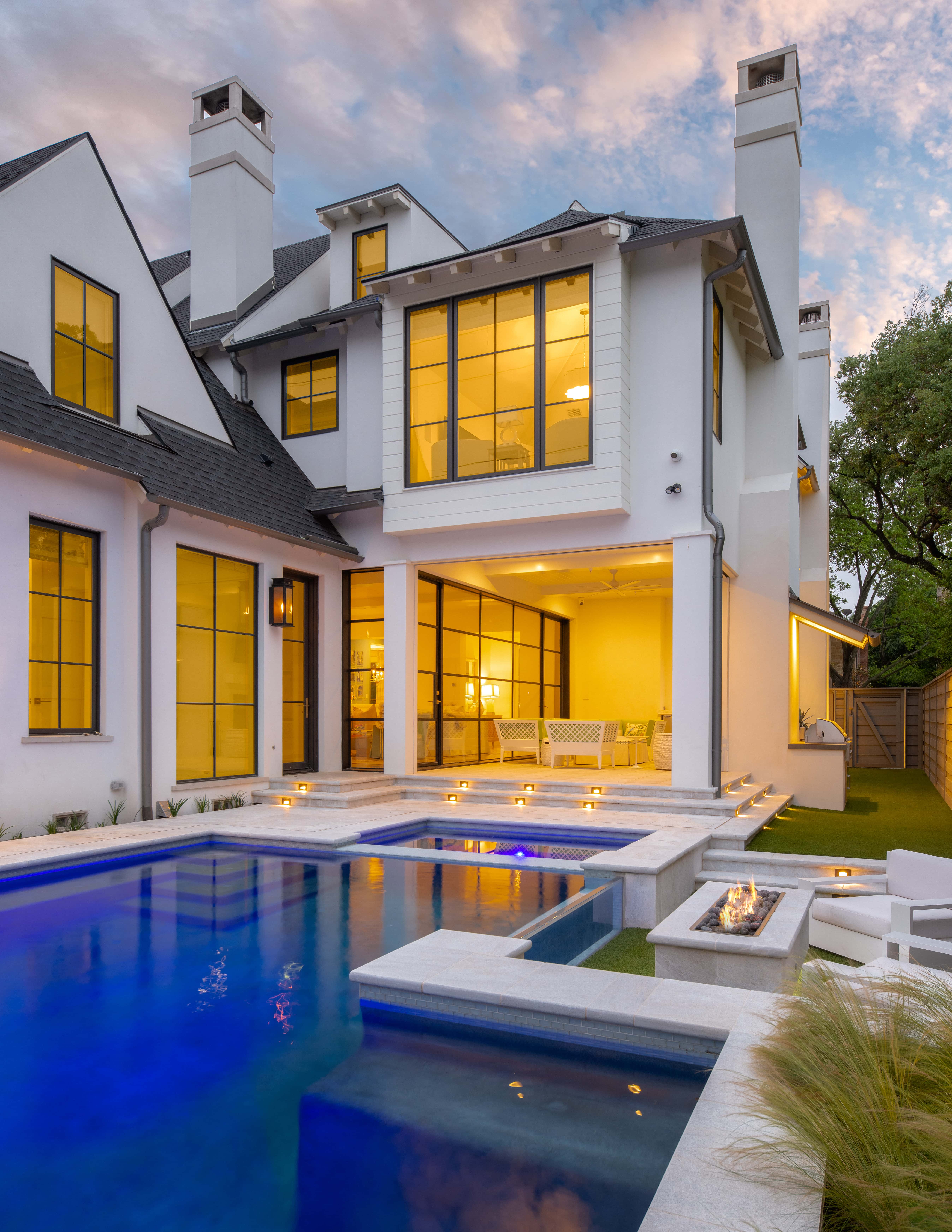 Luxury backyard and pool landscape design on a University Park TX home by Blount Designs
