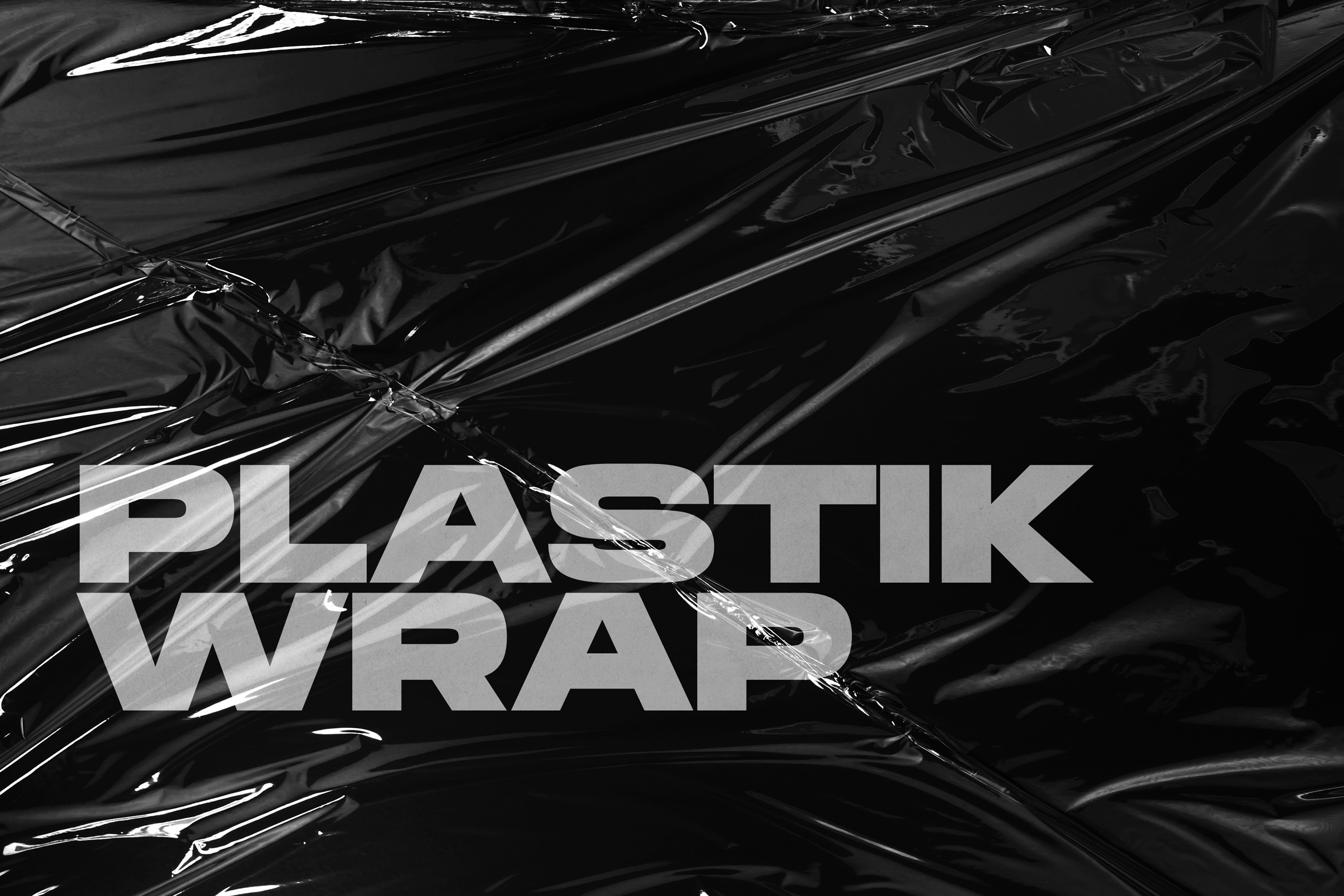 Glossy plastik wrap texture with realistic light reflections and crinkled plastic surface details