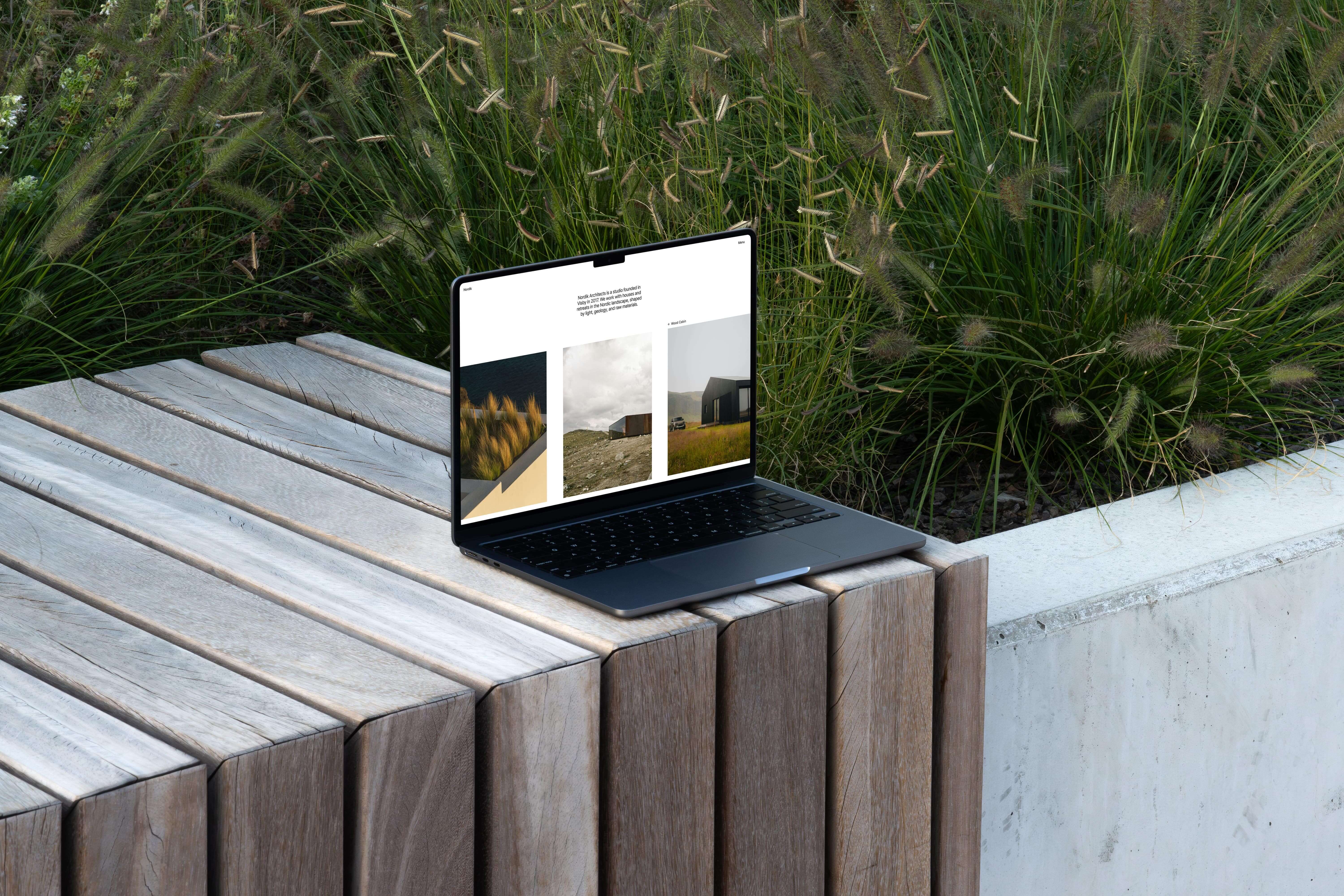 Computer standing in a Scandinavian environment, displaying a website by Lucas Eriksen