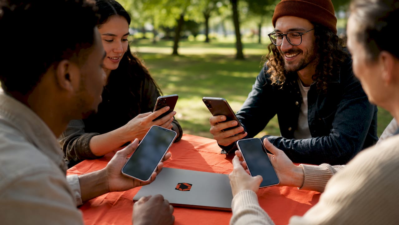 Hands with smartphones participating in beta tester recruitment